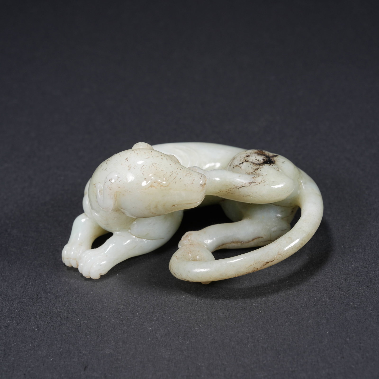 A HETIAN JADE CARVED ANIMAL-FORM FIGURE (1 of 10)