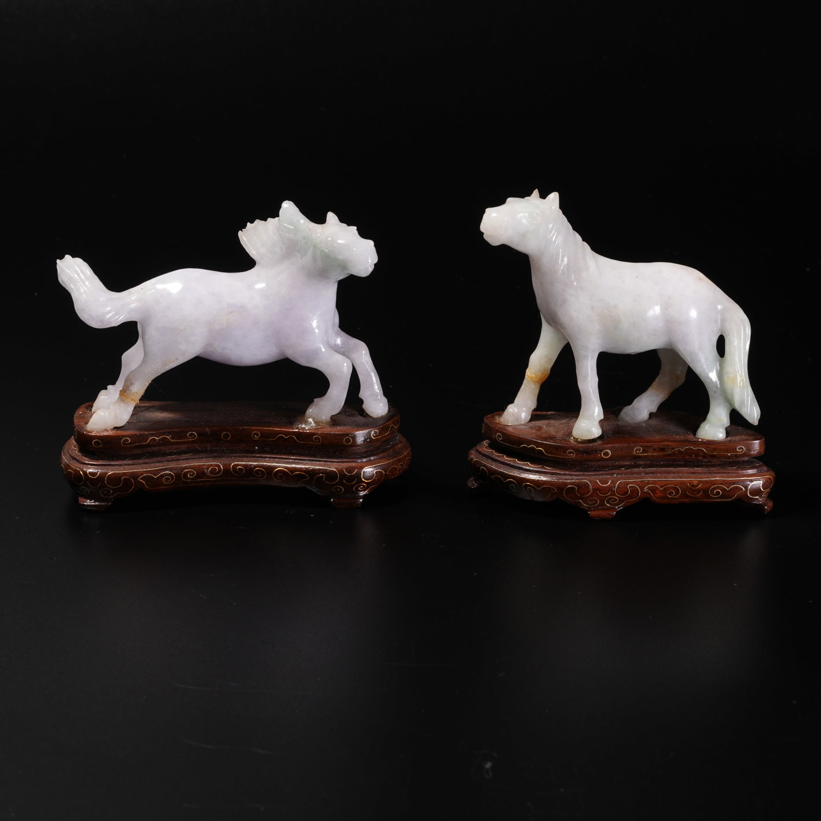 A PAIR OF JADEITE CARVINGS OF GALLOPING HORSES (1 of 12)