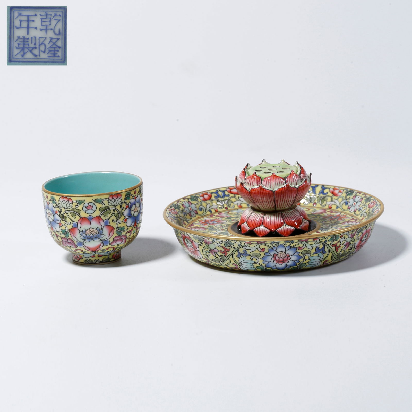 A YELLOW-GLAZED TEA CUP WITH FLORAL DESIGN (1 of 10)