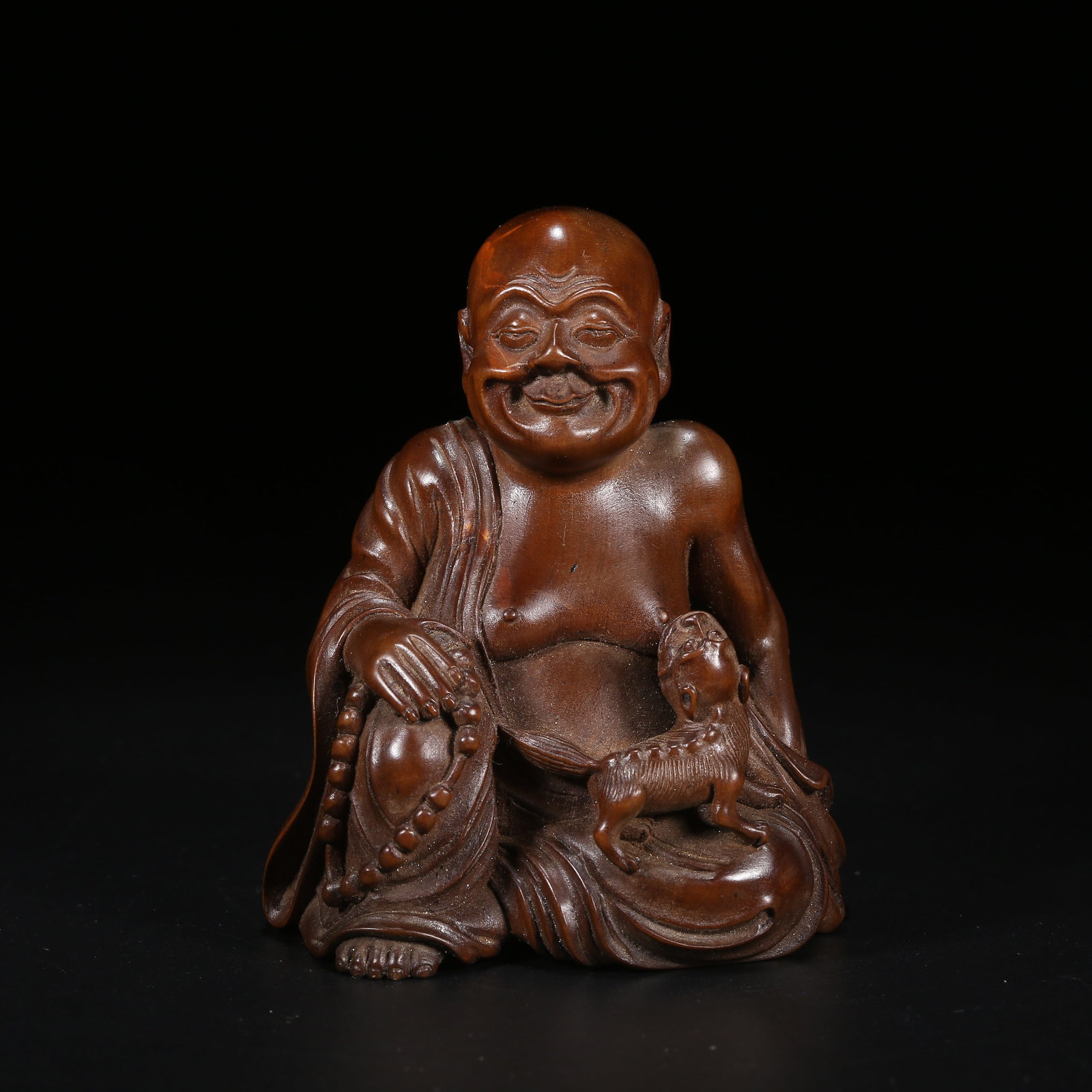 A BOXWOOD ARHAT ORNAMENT: Boxwood Arhat Ornament