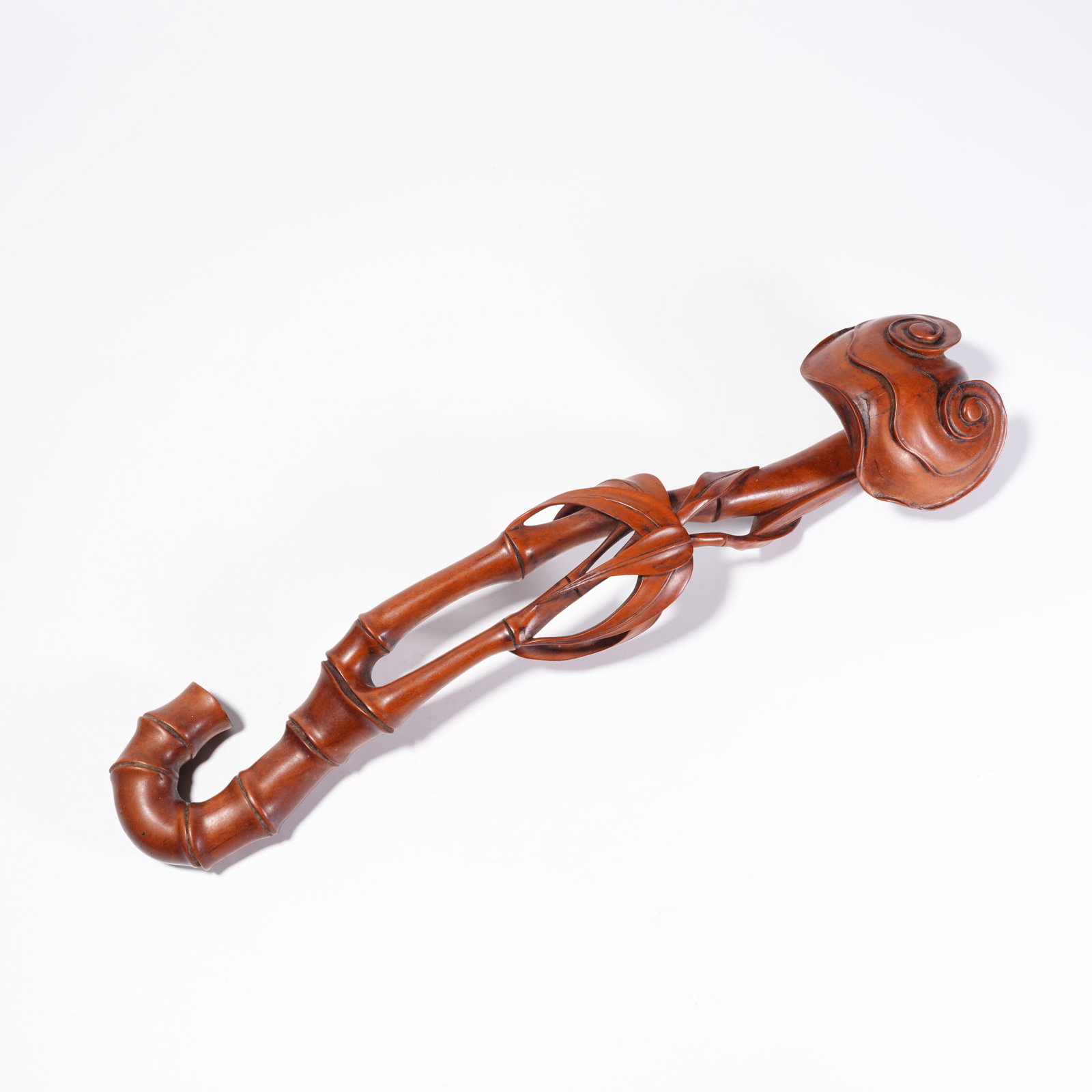 A BOXWOOD CARVING OF BAMBOO-SECTION RUYI (1 of 10)