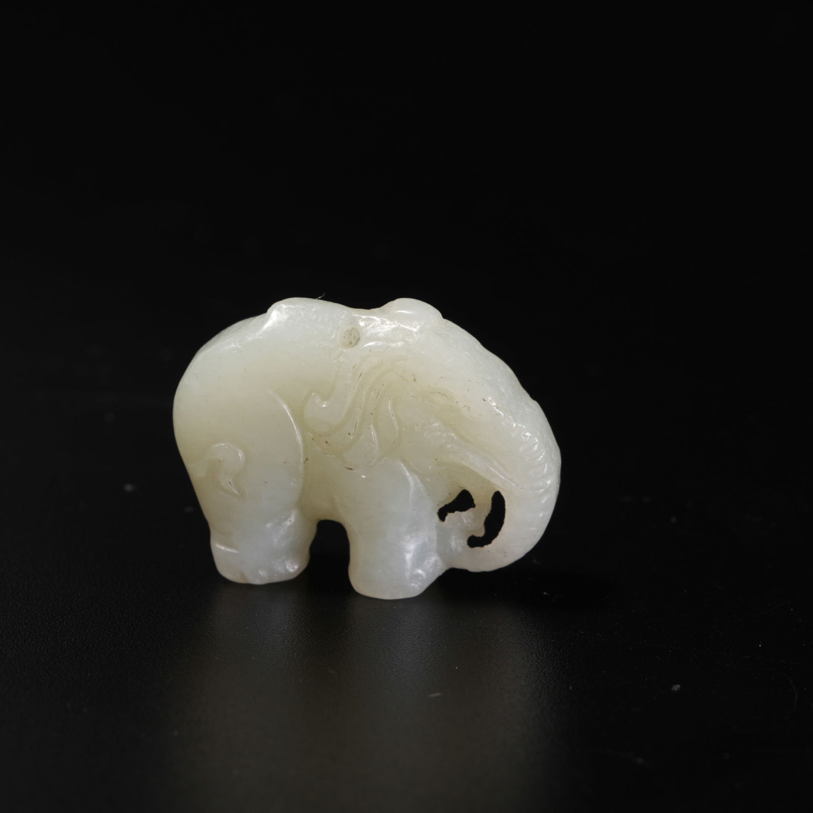 A HETIAN JADE CARVING "PEACE AND PROSPERITY" FIGURINE (1 of 7)