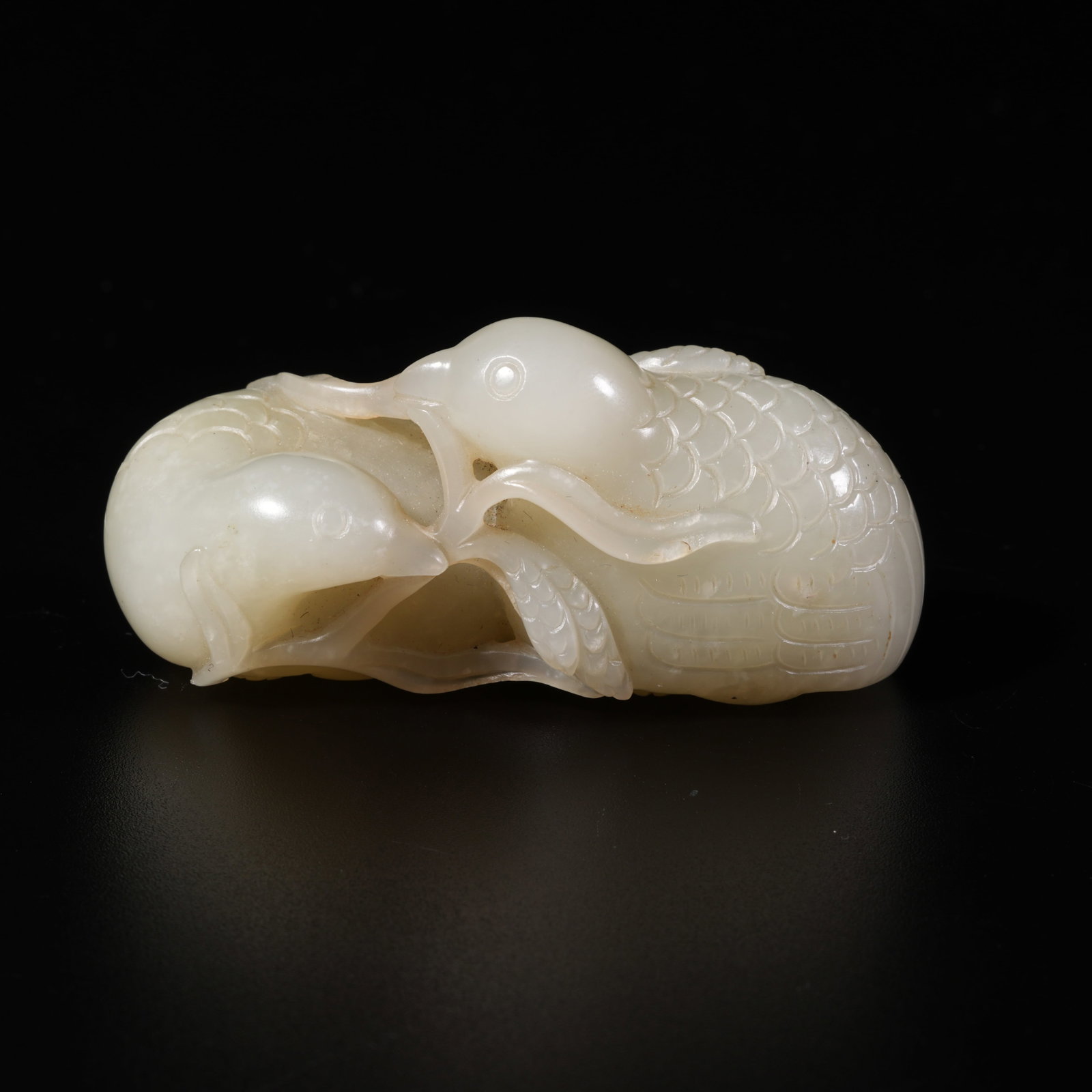 A HETIAN JADE CARVING OF MANDARIN DUCK FIGURINE (1 of 9)