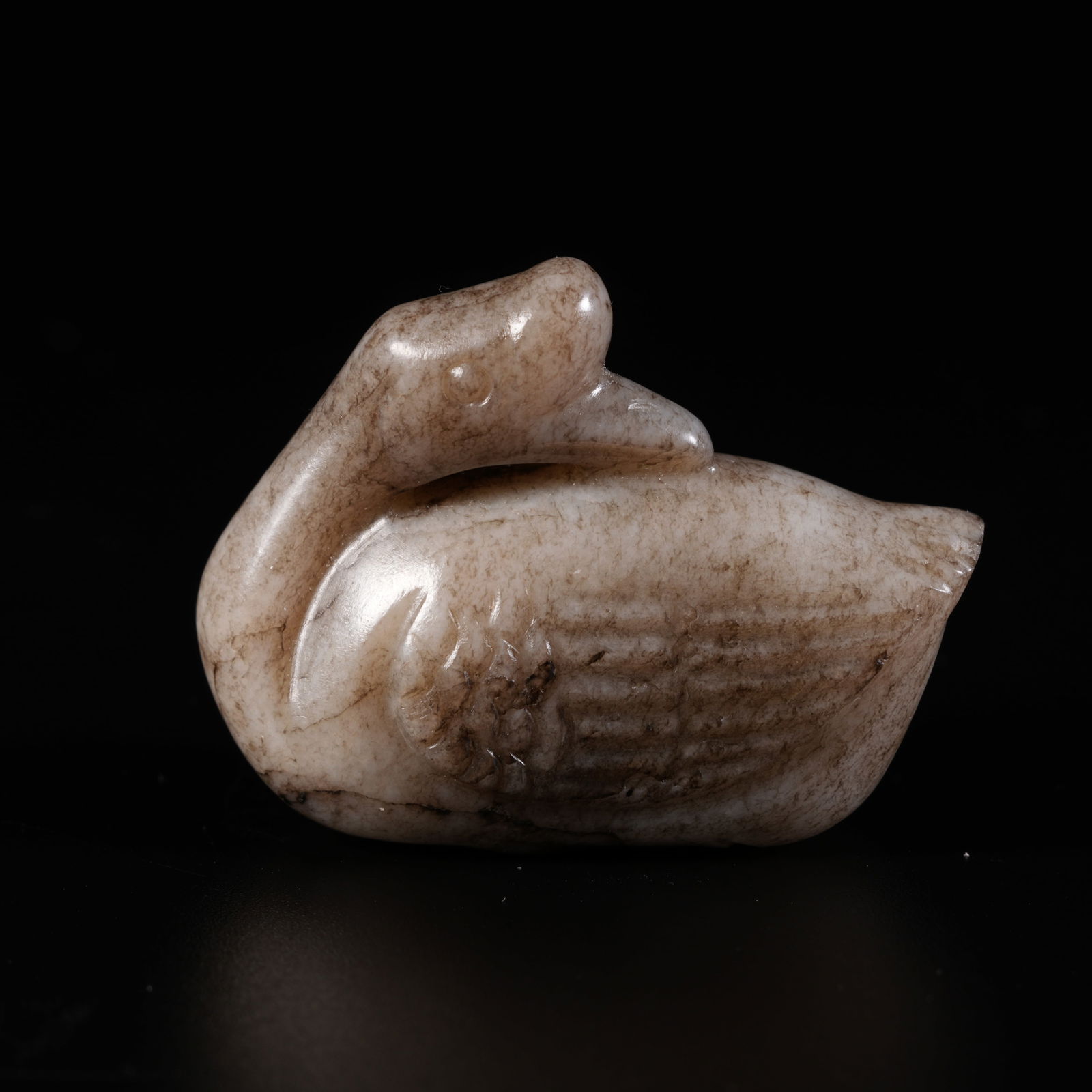 A HETIAN JADE CARVING OF GOOSE-SHAPED FIGURINE (1 of 9)