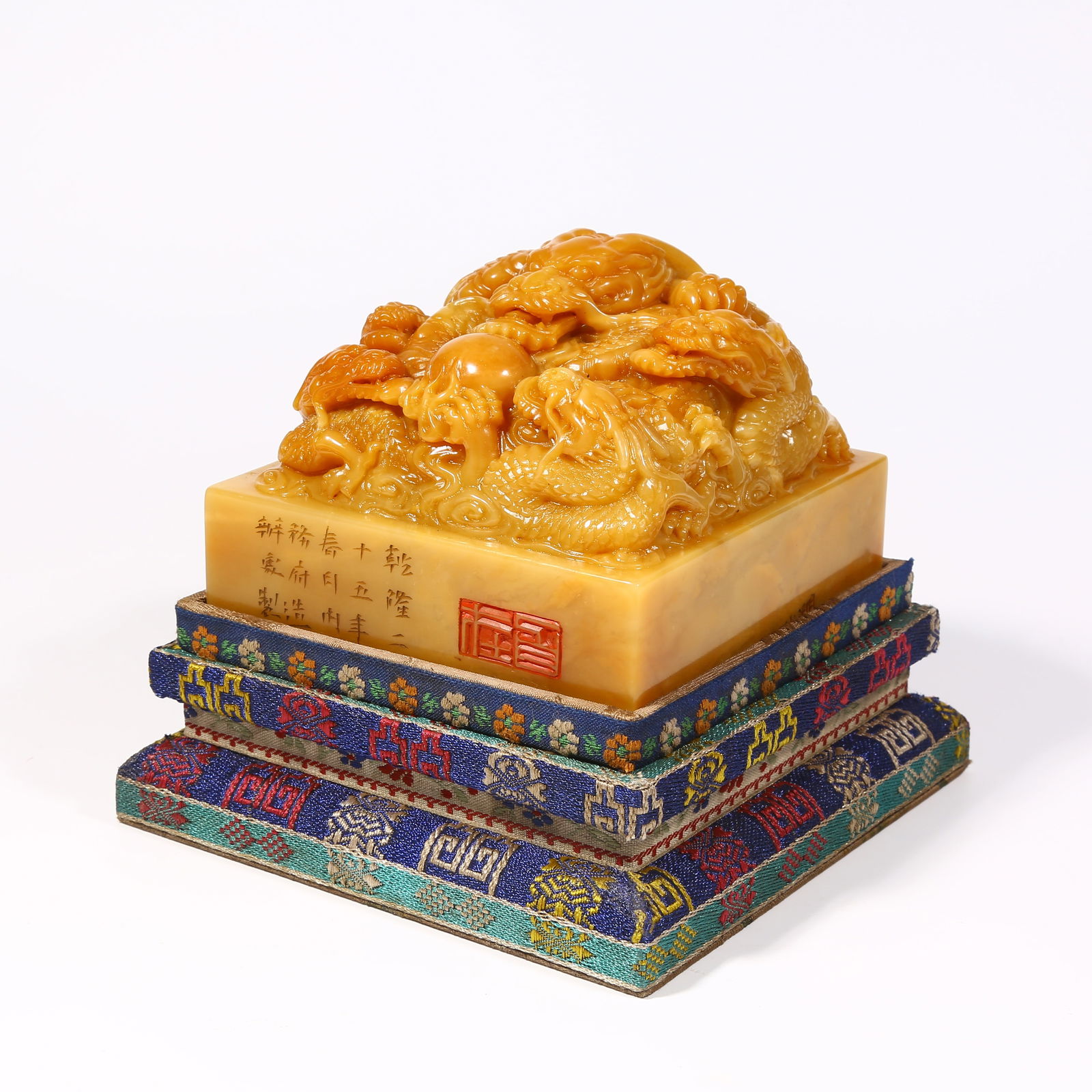 A SHOUSHAN TIANHUANG STONE SEAL WITH DRAGON KNOB: Shoushan Tianhuang stone seal with dragon knob