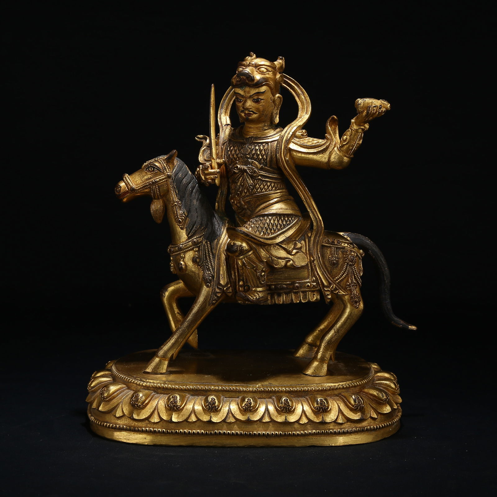 A GILT BRONZE STATUE OF A DHARMAPALA (PROTECTOR DEITY) (1 of 9)