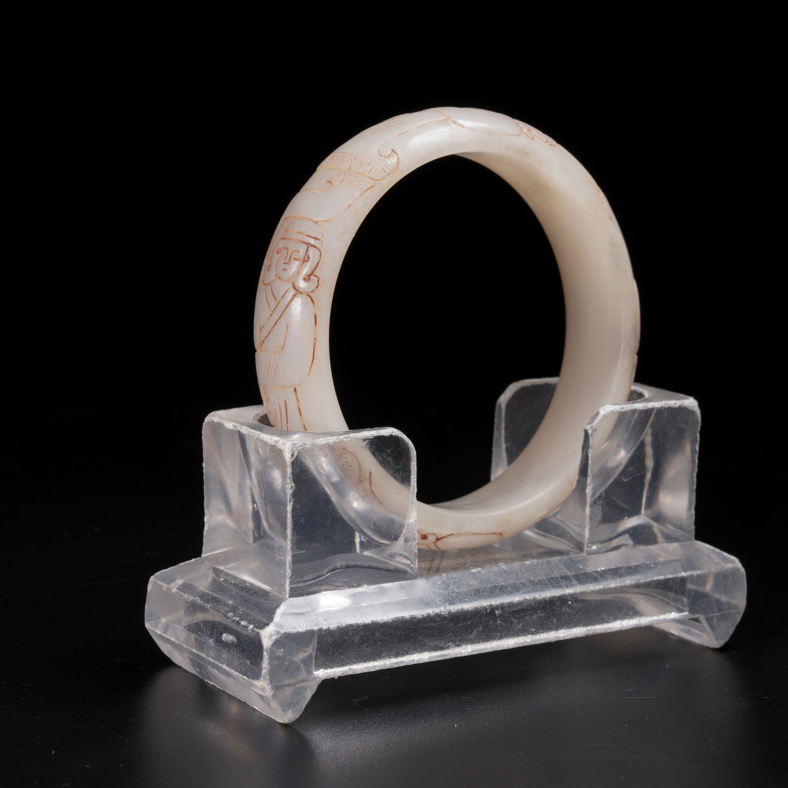 A ARCHAIC JADE DANCING FIGURE–PATTERN BRACELET: Archaic Jade Dancing Figure–Pattern Bracelet