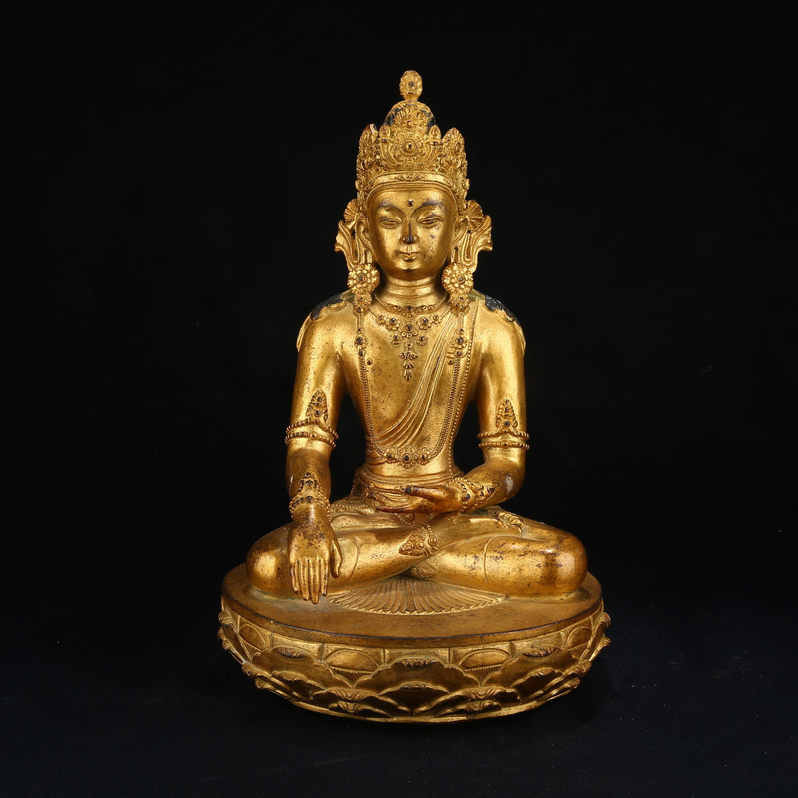 A GILT BRONZE FIGURE OF SHAKYAMUNI BUDDHA WITH CROWN (1 of 8)