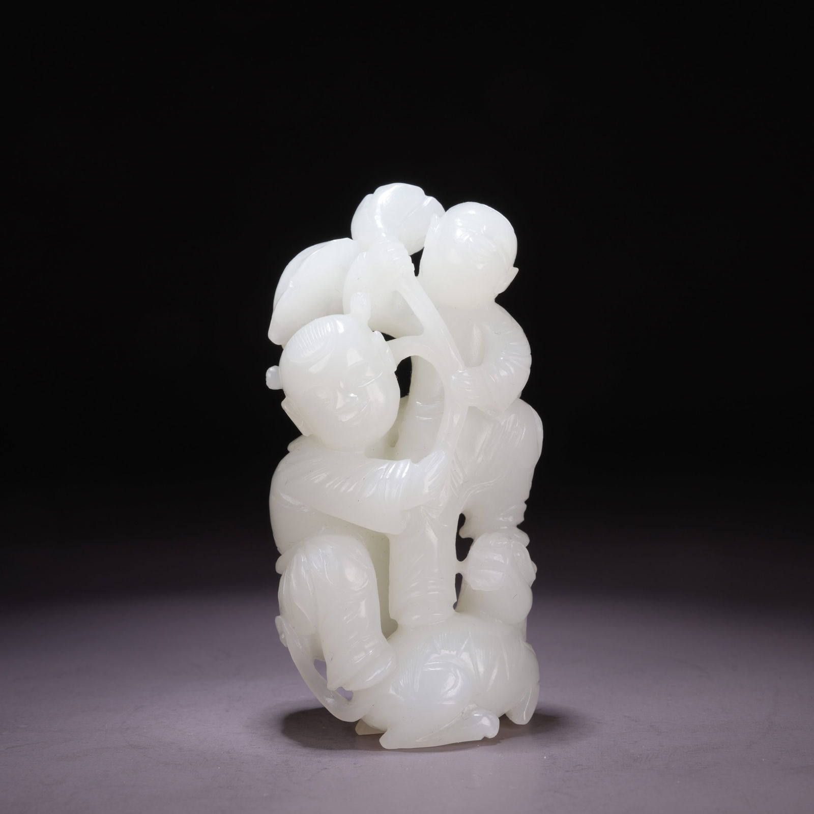A HETIAN JADE HEHE ERXIAN (TWIN IMMORTALS OF HARMONY) ORNAMENT (1 of 9)