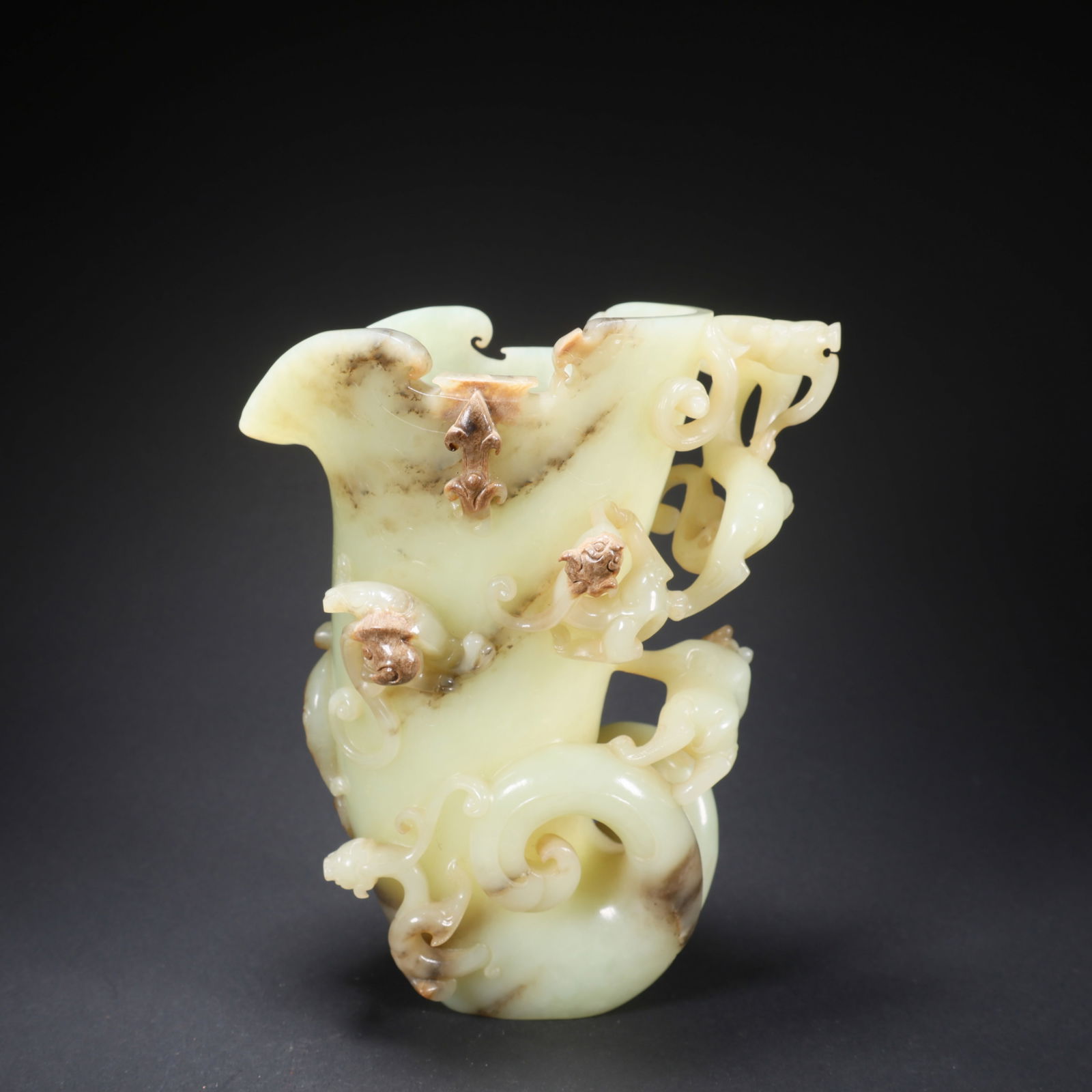 A HETIAN JADE HORN CUP WITH FIVE DRAGONS AND ONE BEAR (1 of 9)