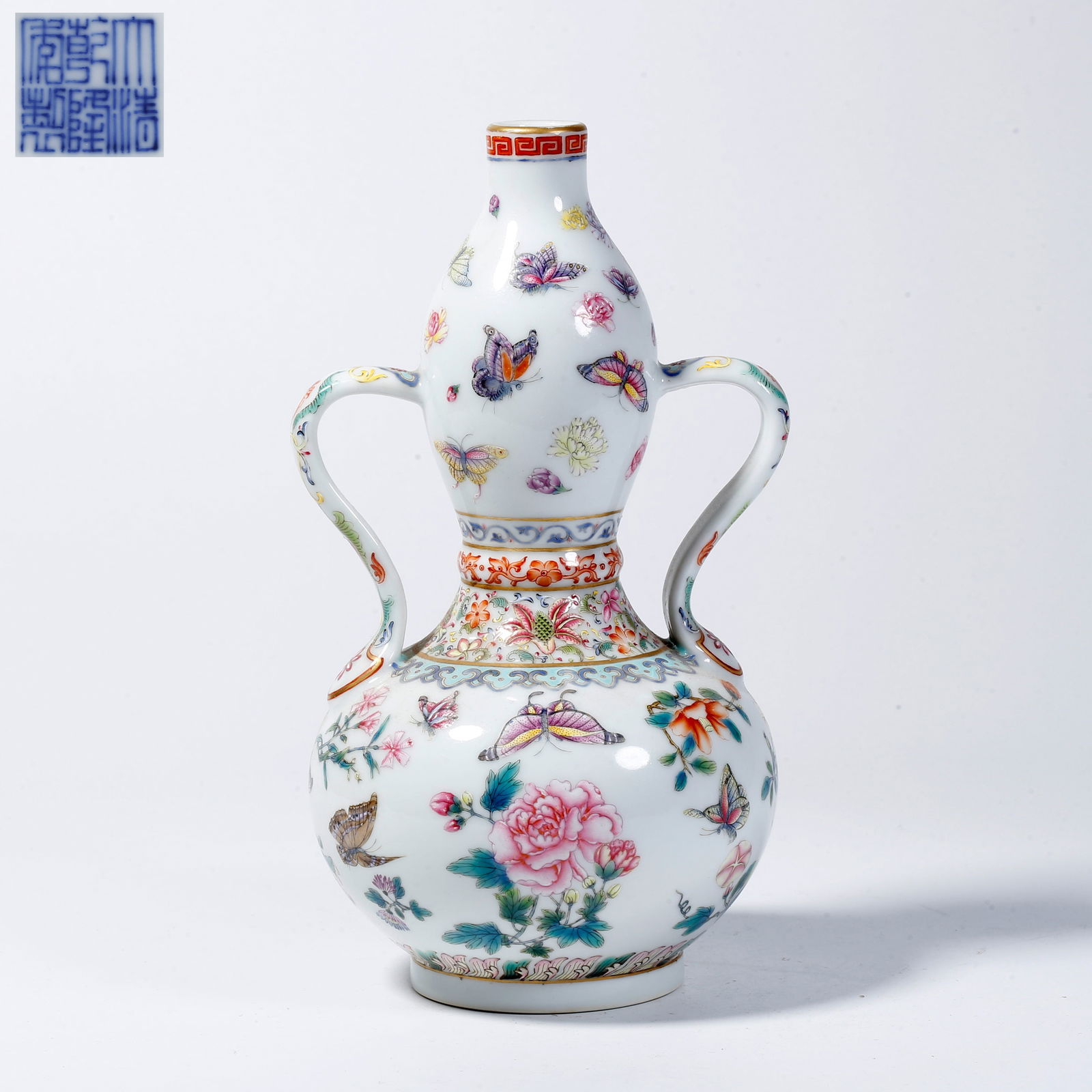 A FAMILLE ROSE GOURD-SHAPED VASE WITH FLOWER AND BUTTERFLY DESIGN (1 of 10)