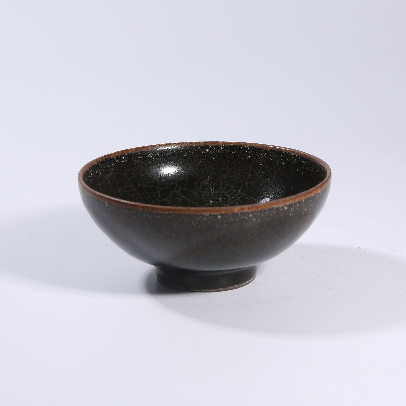 A XIKOU OFFICIAL KILN TEA CUP (1 of 9)