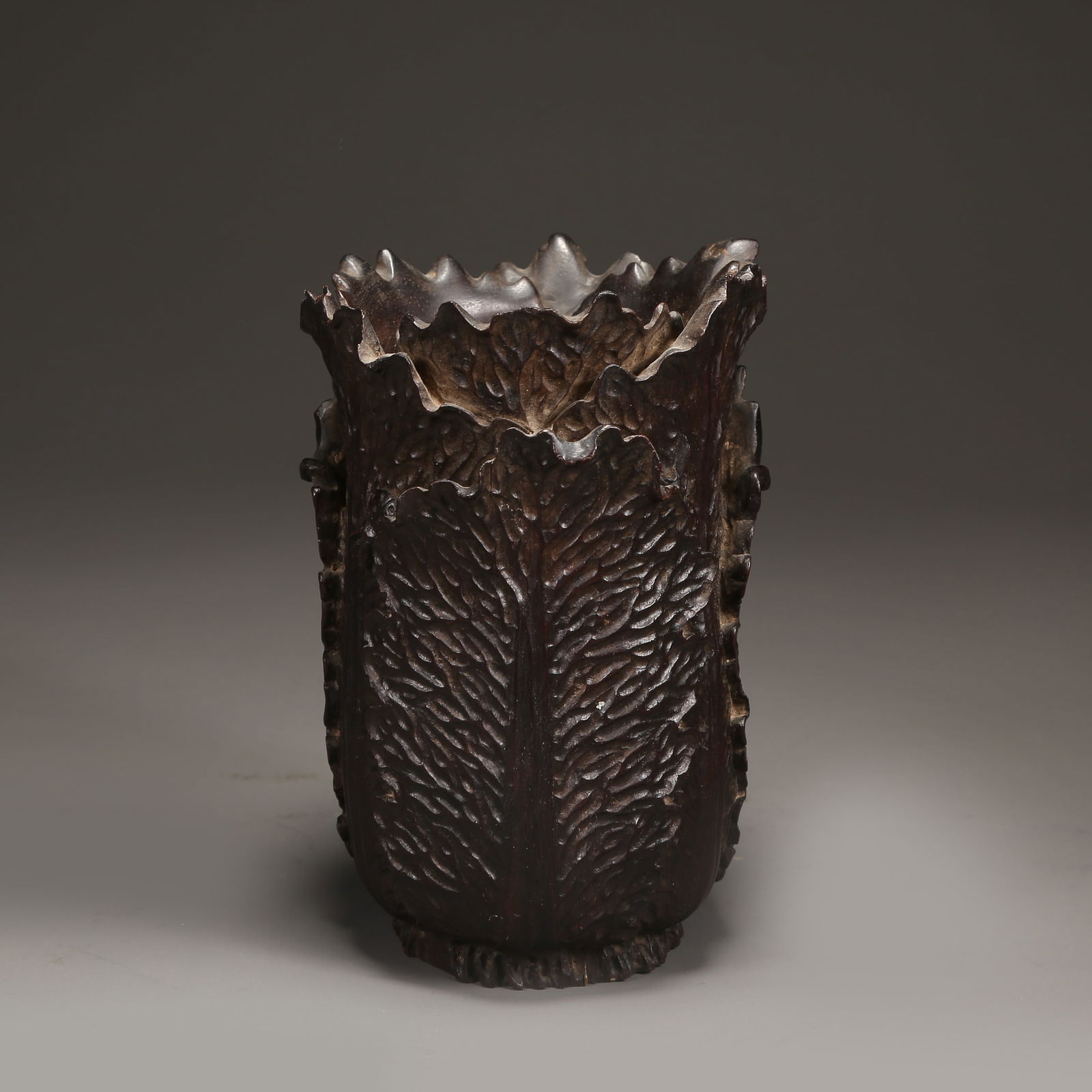 A ZITAN "HUNDRED TREASURES" BRUSH POT: Zitan "Hundred Treasures" brush pot