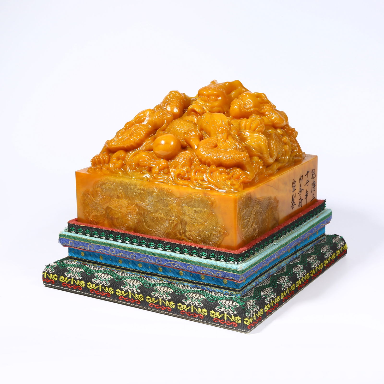 A LARGE SHOUSHAN TIANHUANG STONE SEAL WITH DRAGON KNOB: Large Shoushan Tianhuang stone seal with dragon knob