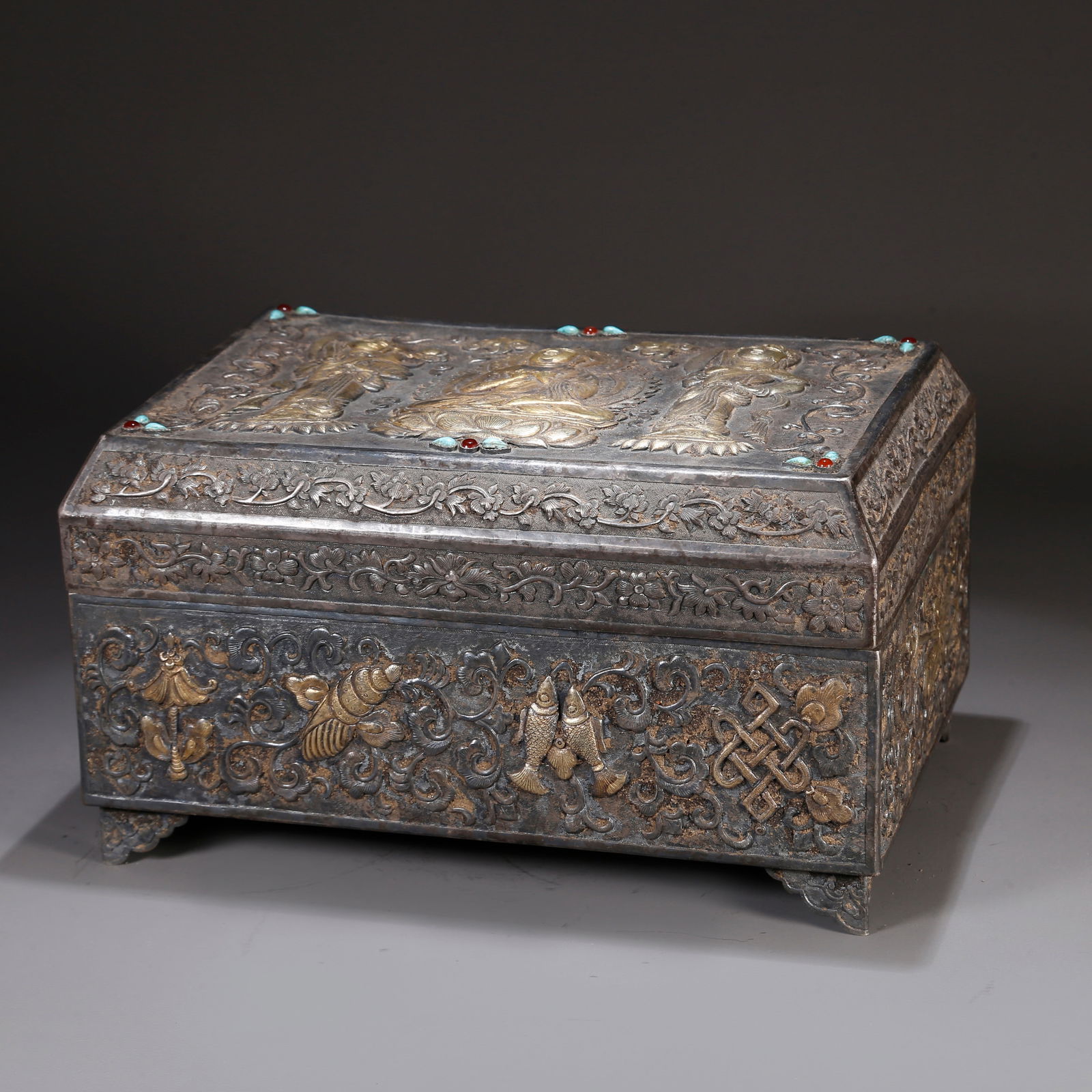 A PARTIALLY GILT SILVER BUDDHIST SCRIPTURES (1 of 10)