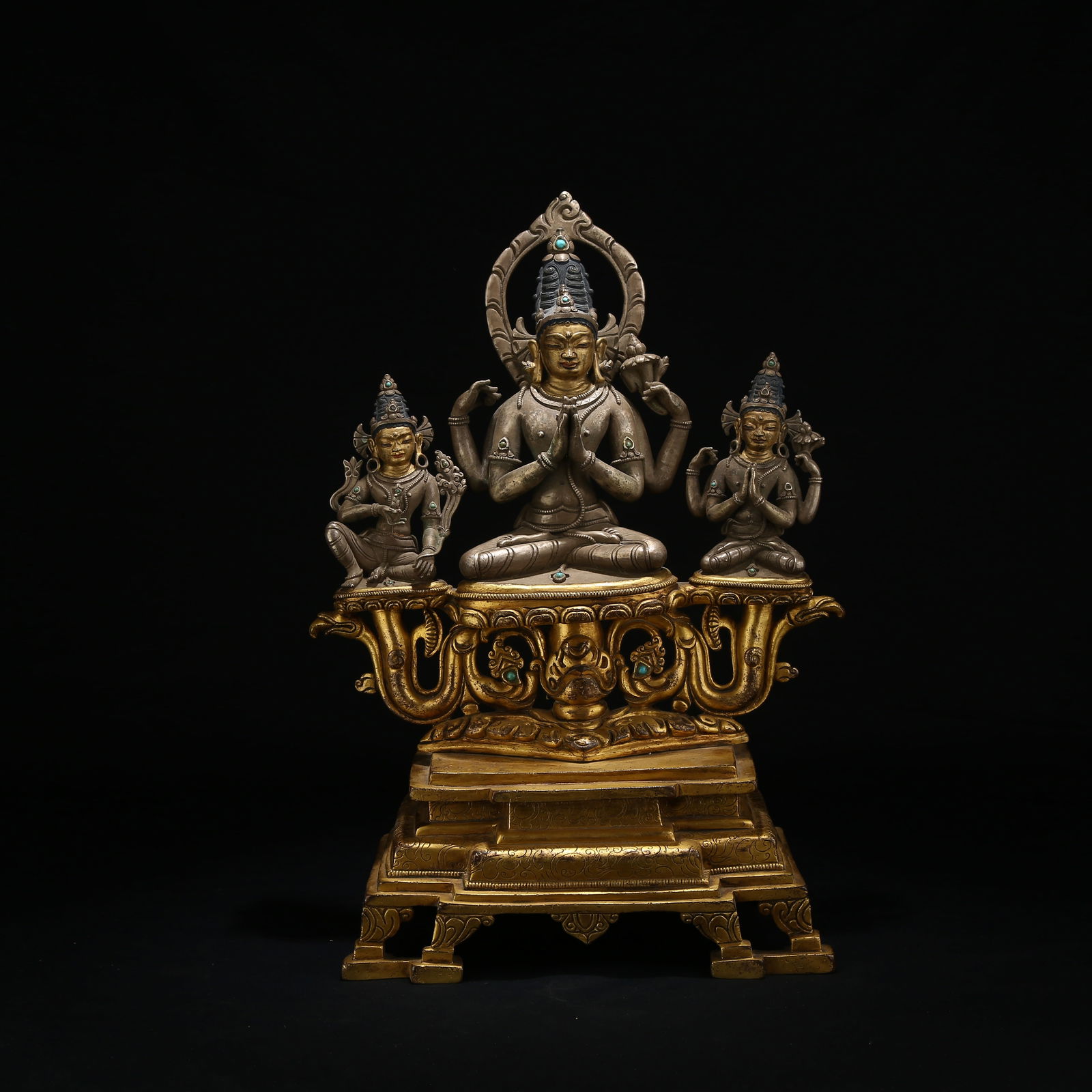 A TIBETAN SILVER STATUE OF FOUR-ARMED AVALOKITESHVARA IN PALA STYLE: Tibetan silver statue of Four-Armed Avalokiteshvara in Pala style
