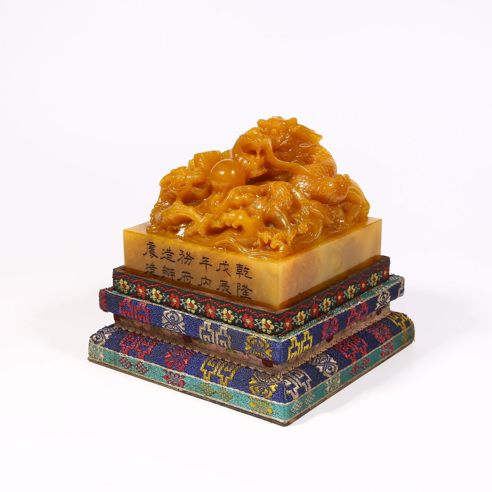 A SHOUSHAN TIANHUANG STONE SEAL WITH DRAGON KNOB: Shoushan Tianhuang stone seal with dragon knob