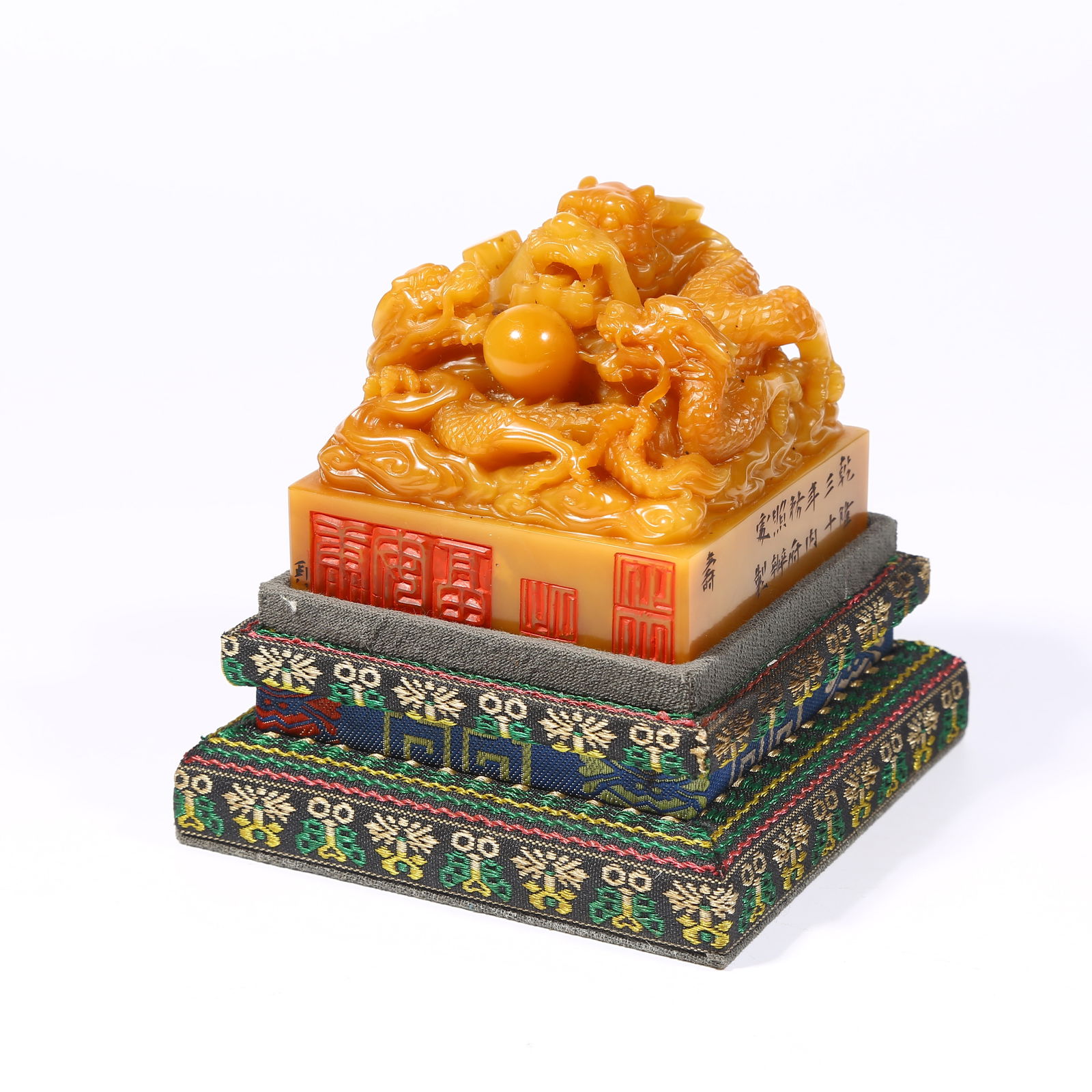 A SHOUSHAN TIANHUANG STONE SEAL WITH DRAGON KNOB: Shoushan Tianhuang stone seal with dragon knob