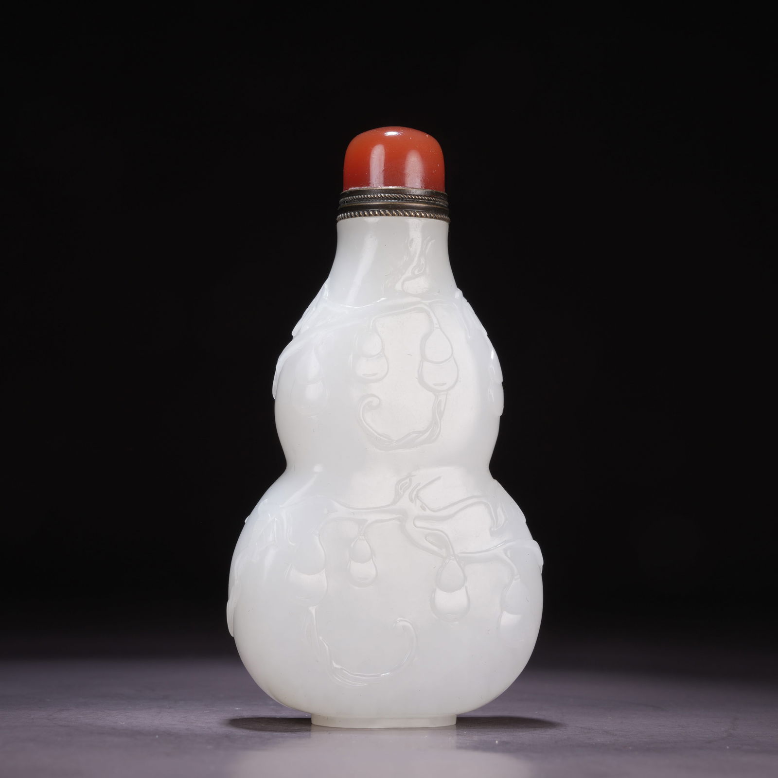 A HETIAN WHITE JADE "BLESSINGS AND PROSPERITY FOR TEN THOUSAND GENERATIONS" SNUFF BOTTLE (1 of 9)