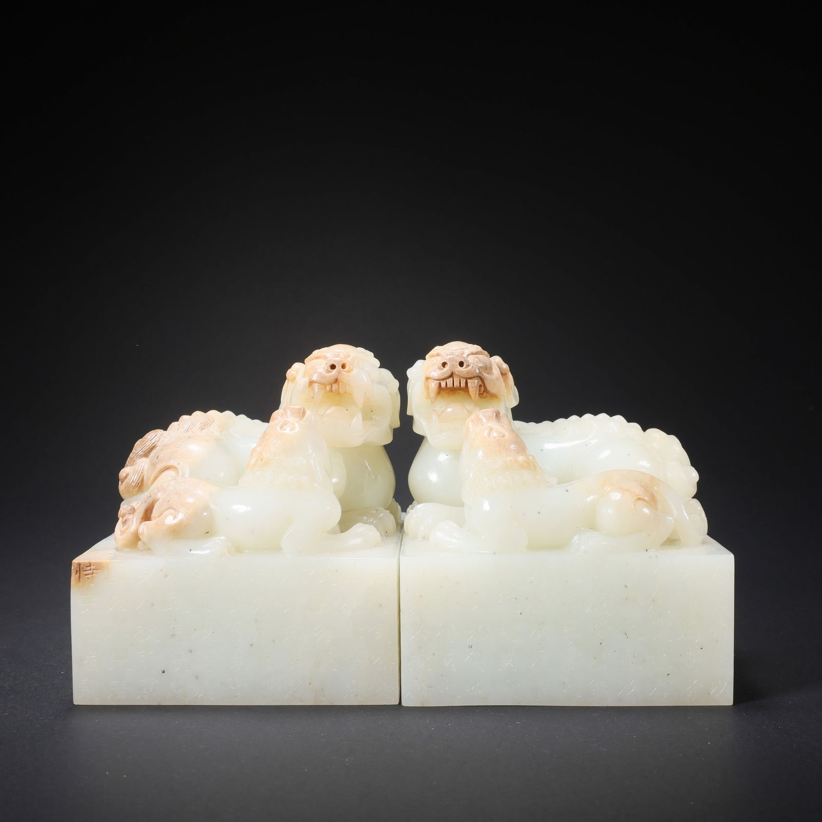 A PAIR OF HETIAN JADE MOTHER-AND-CHILD BEAST SEALS WITH POETRY (1 of 9)