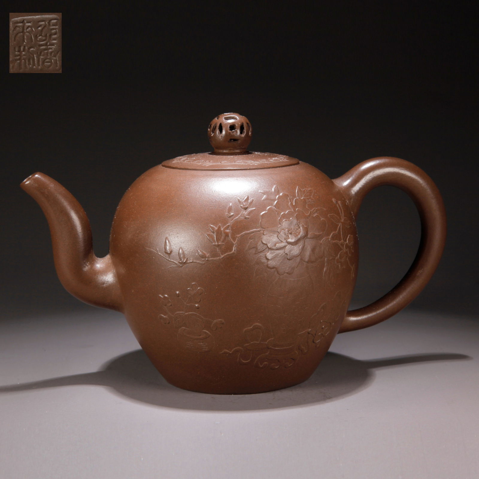 A ZISHA CLAY EWER WITH CARVED FLORAL PATTERN: Zisha Clay Ewer with Carved Floral Pattern