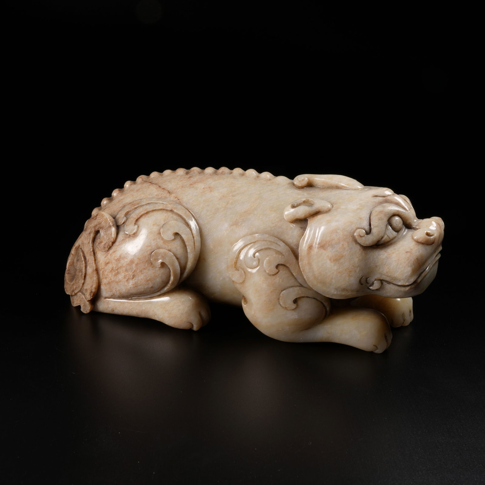 A ARCHAIC JADE RECUMBENT BEAST ORNAMENT: Archaic Jade Recumbent Beast Ornament