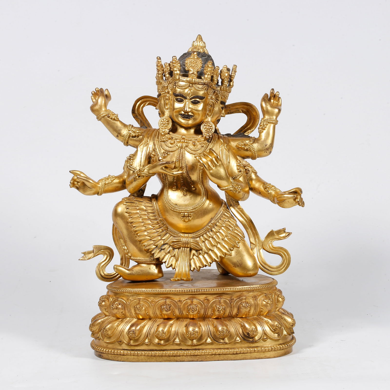 A GILT-BRONZE BUDDHA STATUE (1 of 9)
