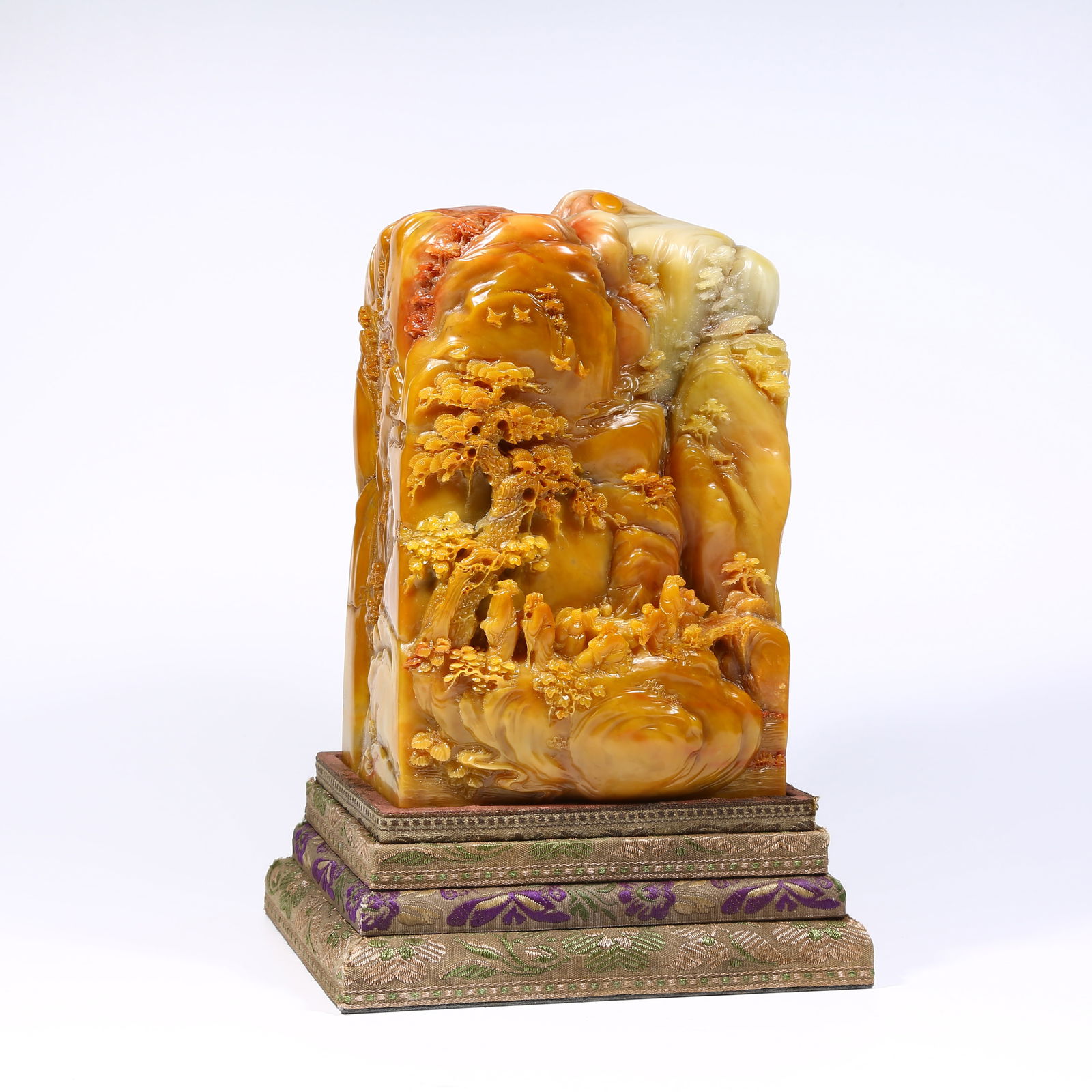 A LARGE SHOUSHAN STONE SEAL WITH LANDSCAPE, FIGURES, AND STORY DESIGN: Large Shoushan stone seal with landscape, figures, and story design