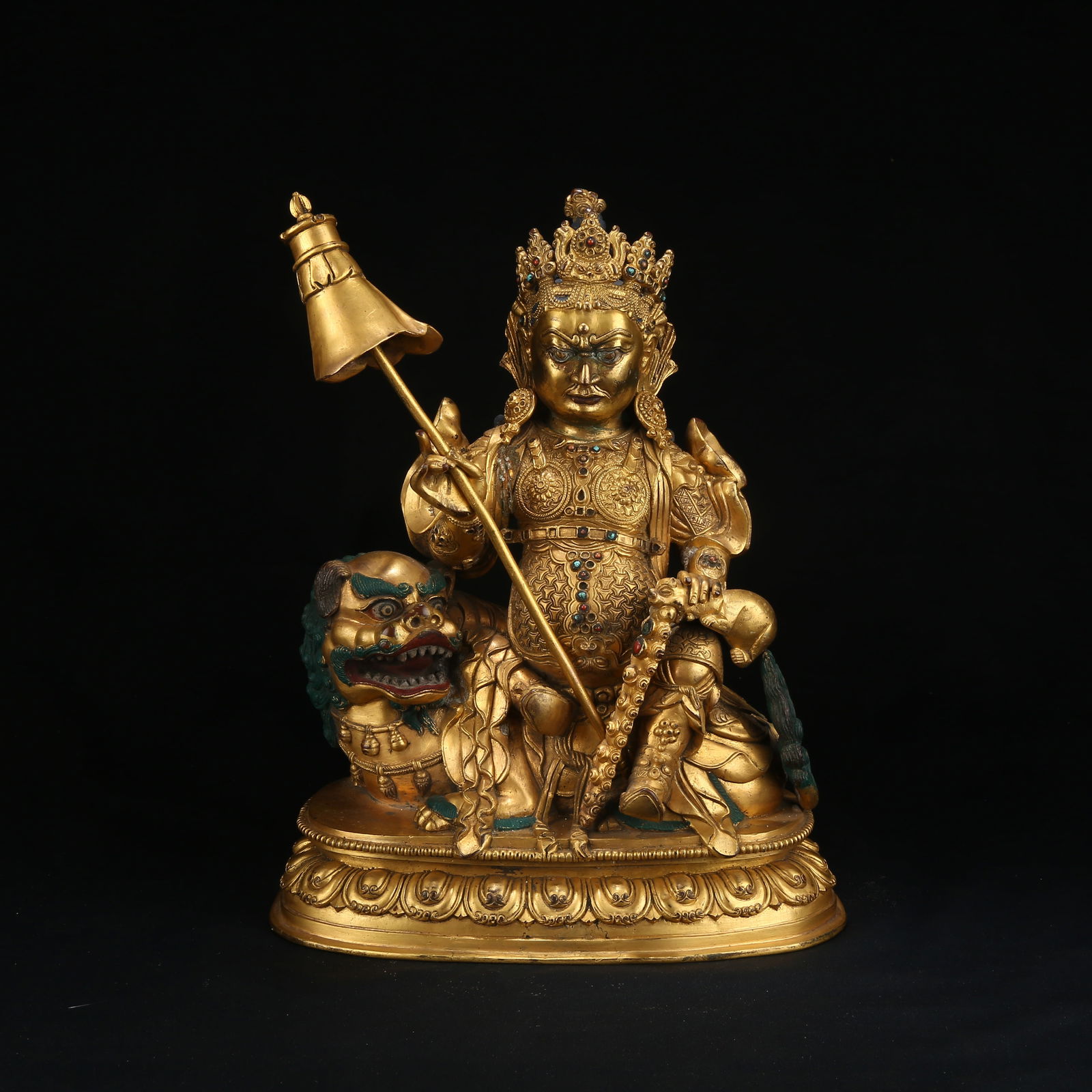 A GILT BRONZE FIGURE OF THE TREASURE KING (VAI?RAVA?A) (1 of 8)
