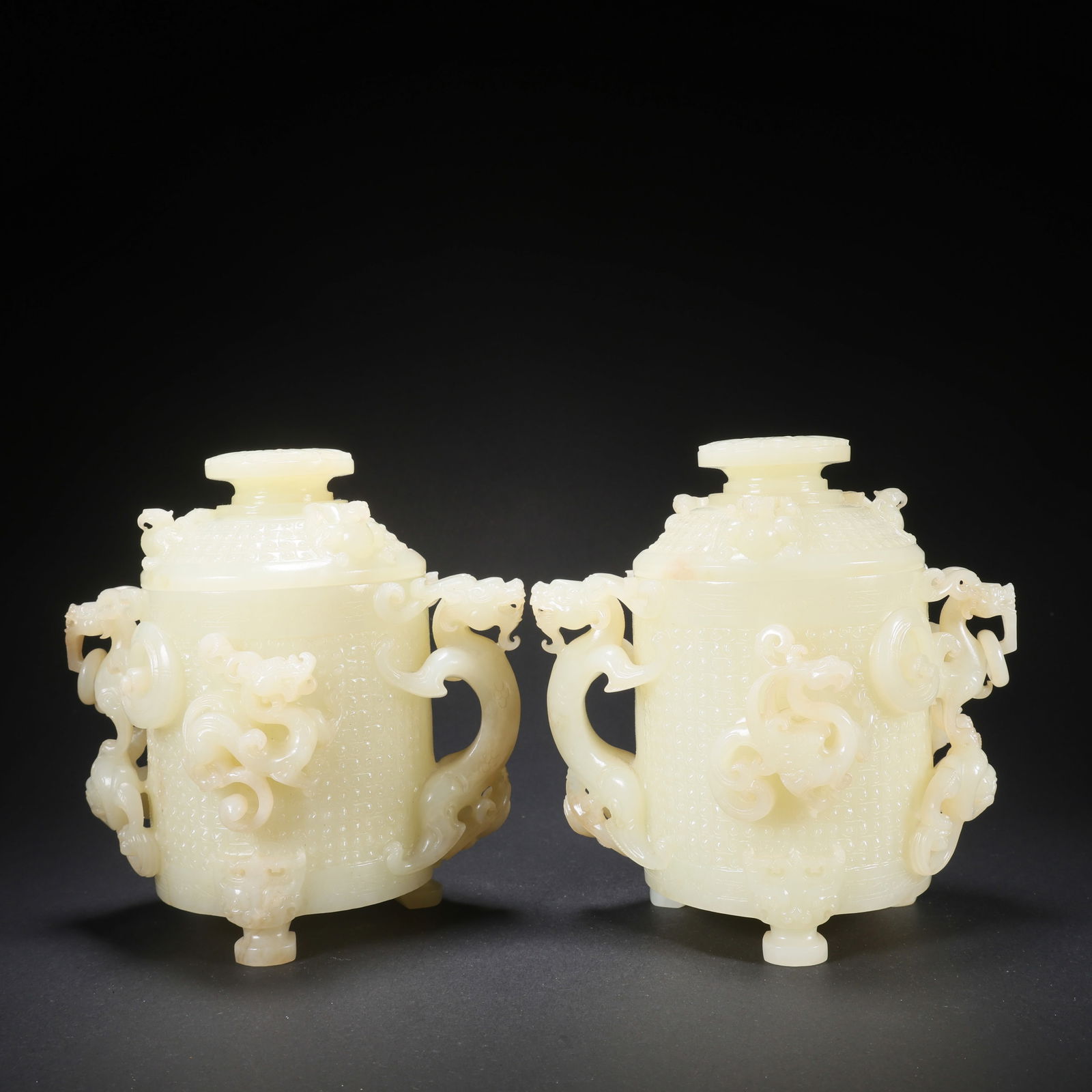 A PAIR OF HETIAN JADE COVERED CUPS CARVED WITH FOUR DIVINE BEASTS (1 of 9)
