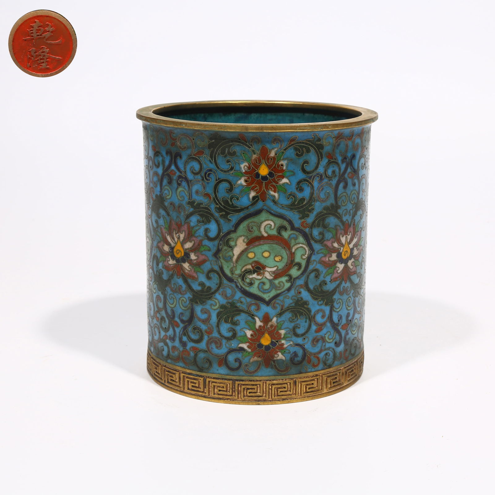 A CLOISONNÉ ENAMEL BRUSH POT WITH INTERTWINING LOTUS DESIGN: Cloisonné Enamel Brush Pot with Intertwining Lotus Design