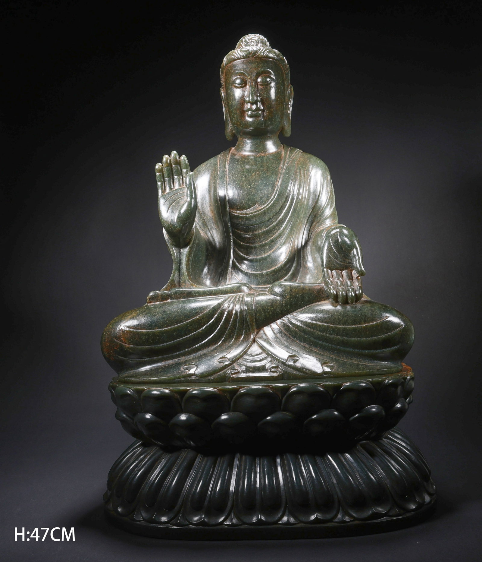 A HETIAN JADE SEATED SHAKYAMUNI ON BASE (1 of 9)