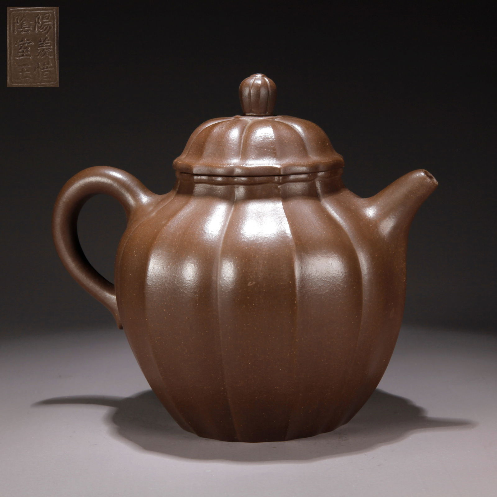 A ZISHA CLAY EWER WITH GOURD RIBBED PATTERN: Zisha Clay Ewer with Gourd Ribbed Pattern