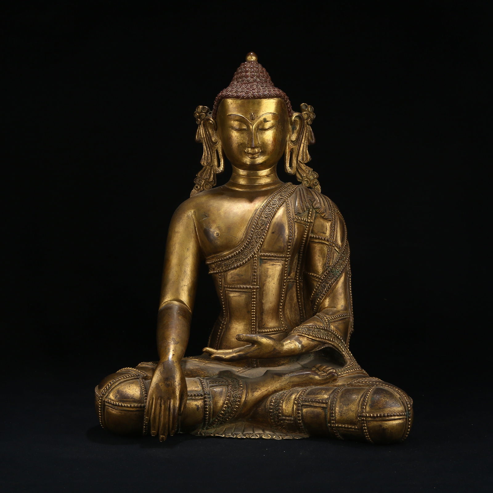 A GILT BRONZE FIGURE OF SHAKYAMUNI BUDDHA (1 of 8)