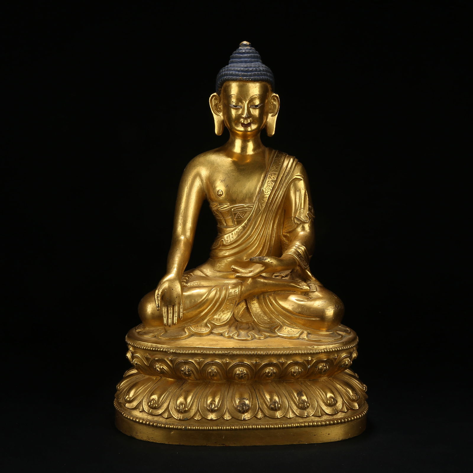 A GILT BRONZE FIGURE OF RATNASAMBHAVA BUDDHA (1 of 8)
