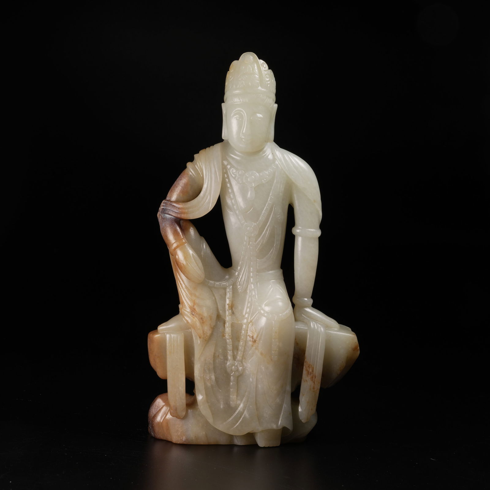 A HETIAN JADE GUANYIN FIGURE (1 of 9)