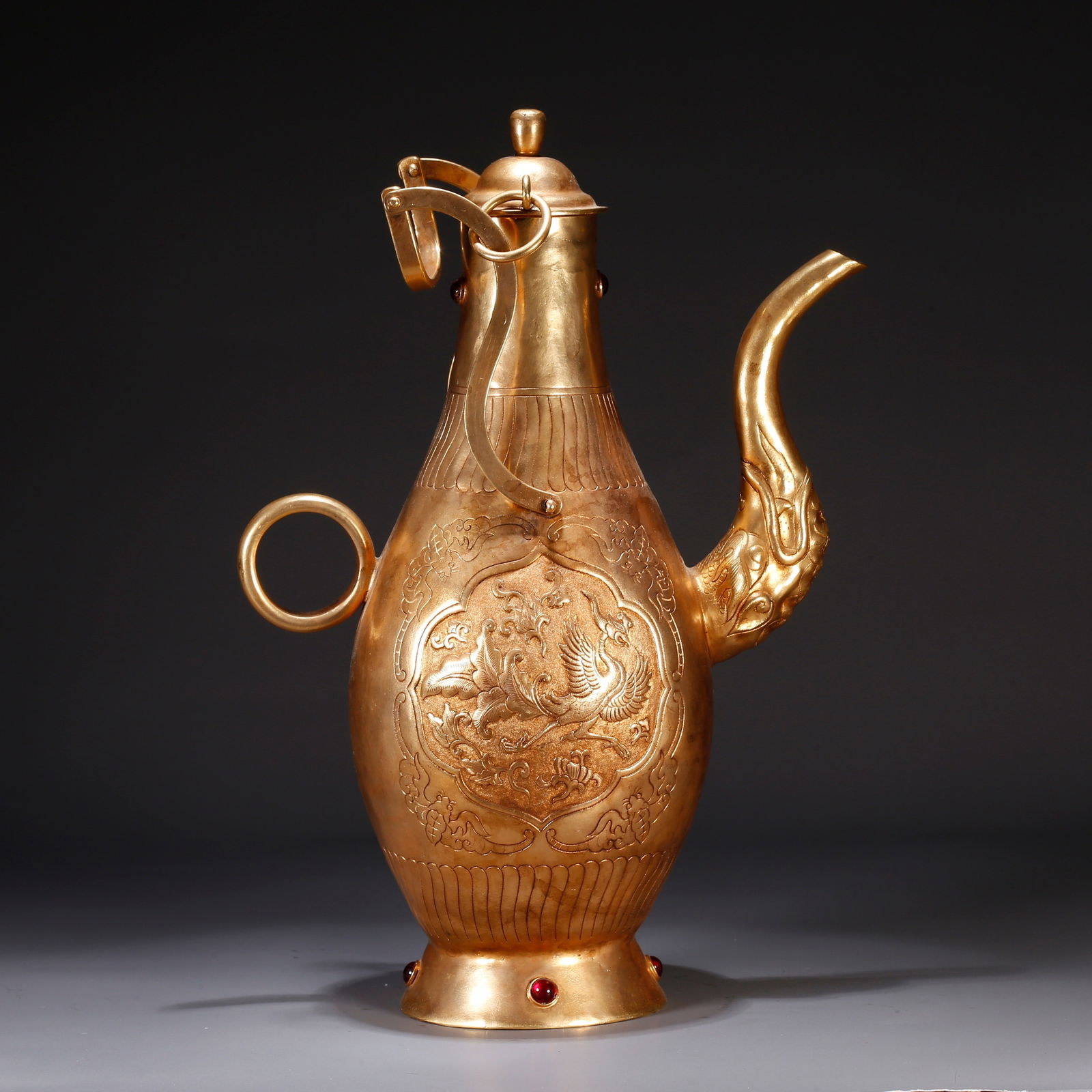 A GILT BRONZE EWER WITH PHOENIX MOTIF (1 of 9)