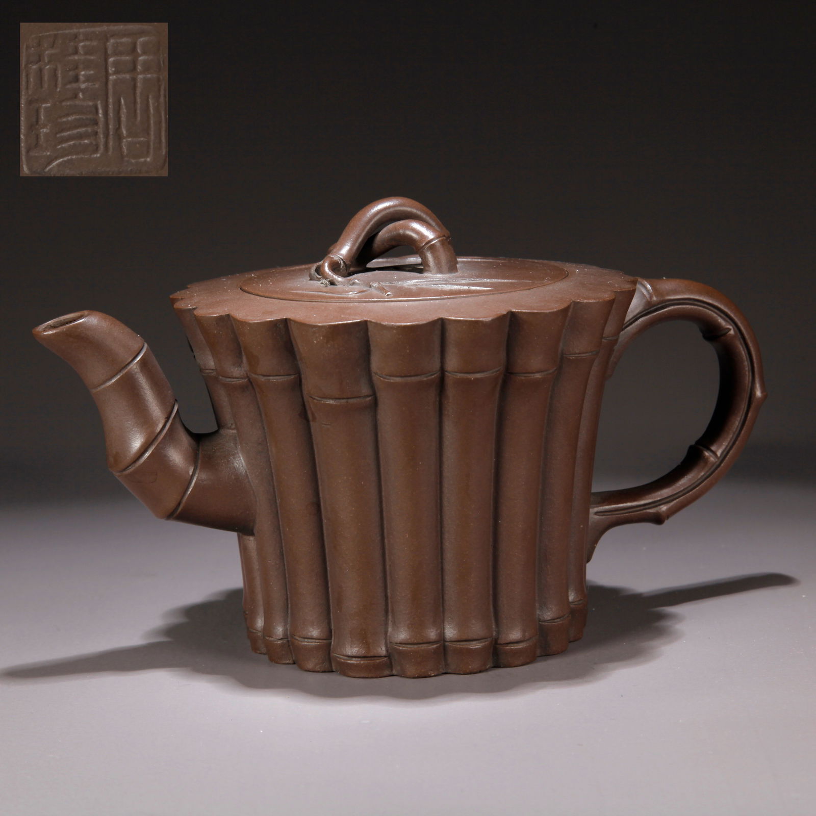 A ZISHA CLAY EWER WITH CARVED BAMBOO PATTERN: Zisha Clay Ewer with Carved Bamboo Pattern