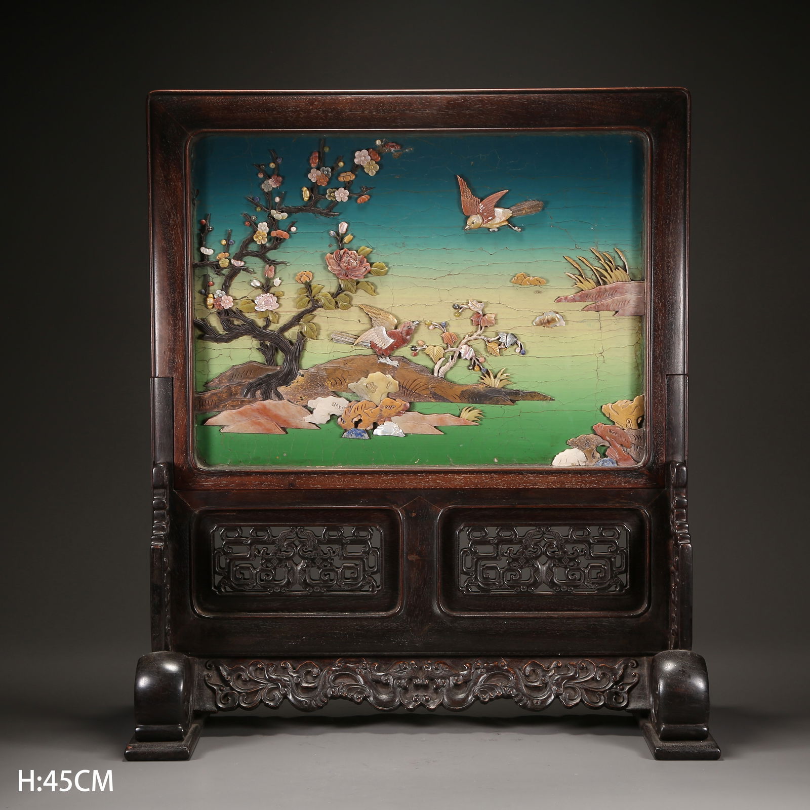 A ZITAN SCREEN WITH BAIBAO-INLAID BIRD-AND-FLOWER DESIGN: Zitan screen with baibao-inlaid bird-and-flower design