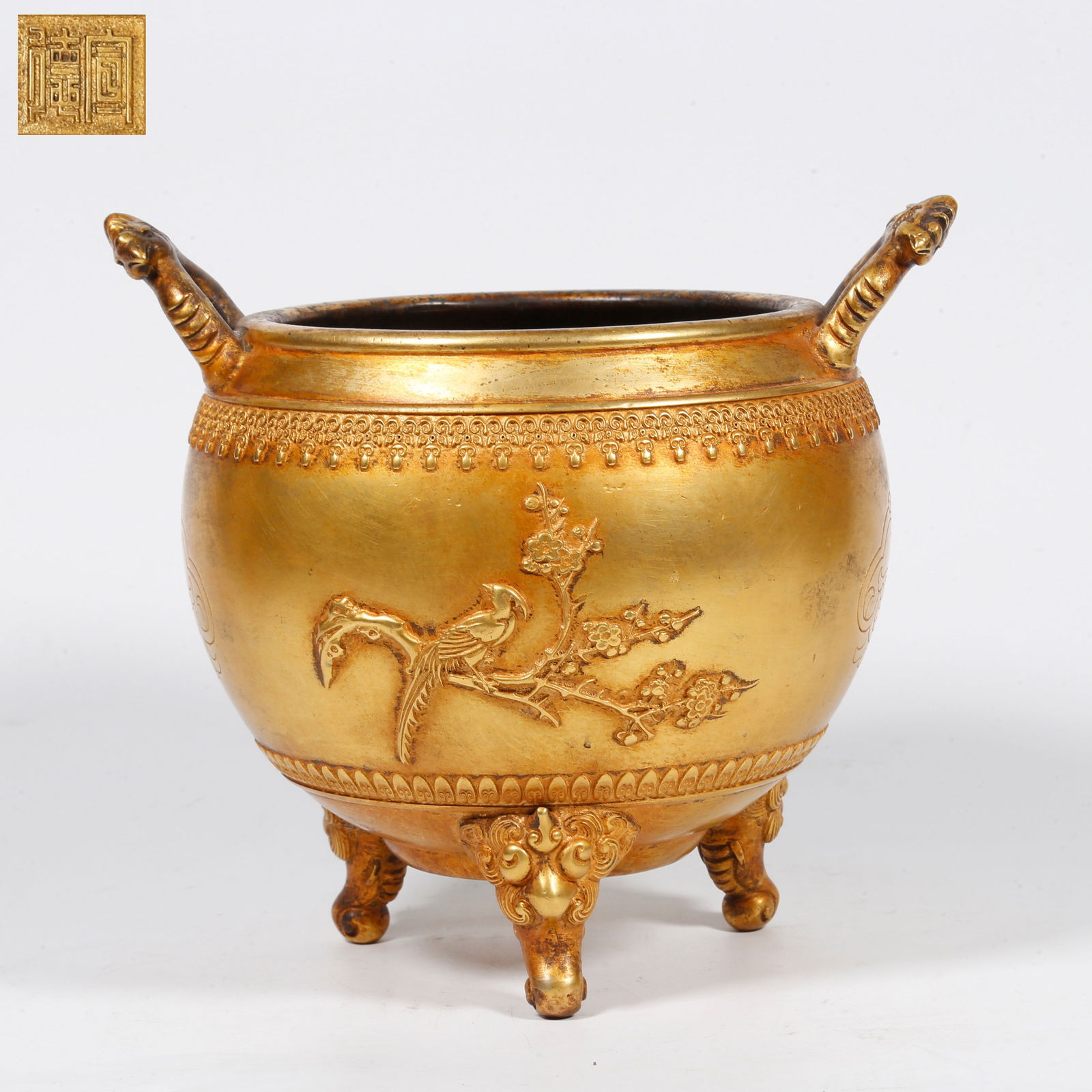 A HETIAN JADE INCENSE BURNER WITH FLORAL AND BIRD PATTERNS: Hetian jade incense burner with floral and bird patterns