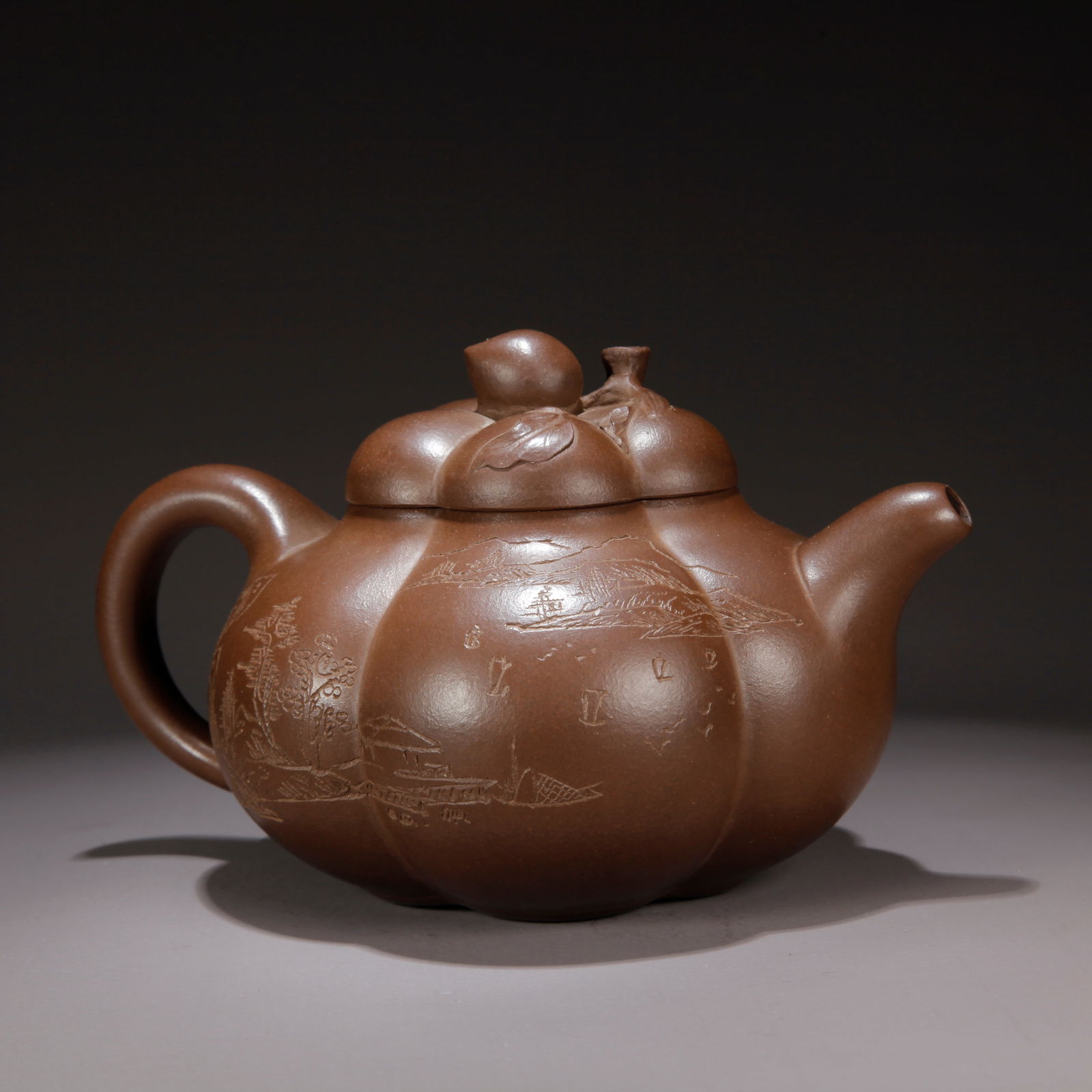 A ZISHA CLAY CARVED POETRY AND CALLIGRAPHY EWER: Zisha Clay Carved Poetry and Calligraphy Ewer