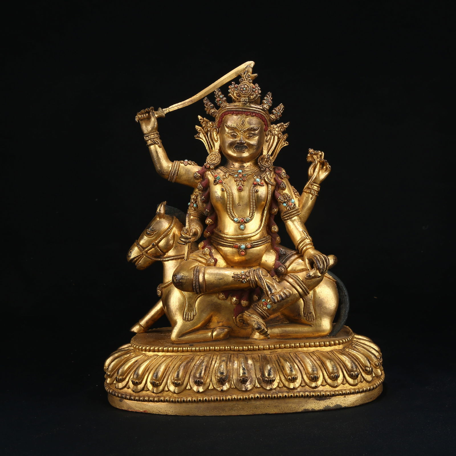 A GILT BRONZE FIGURE OF FOUR-ARMED LONGEVITY GODDESS (1 of 8)