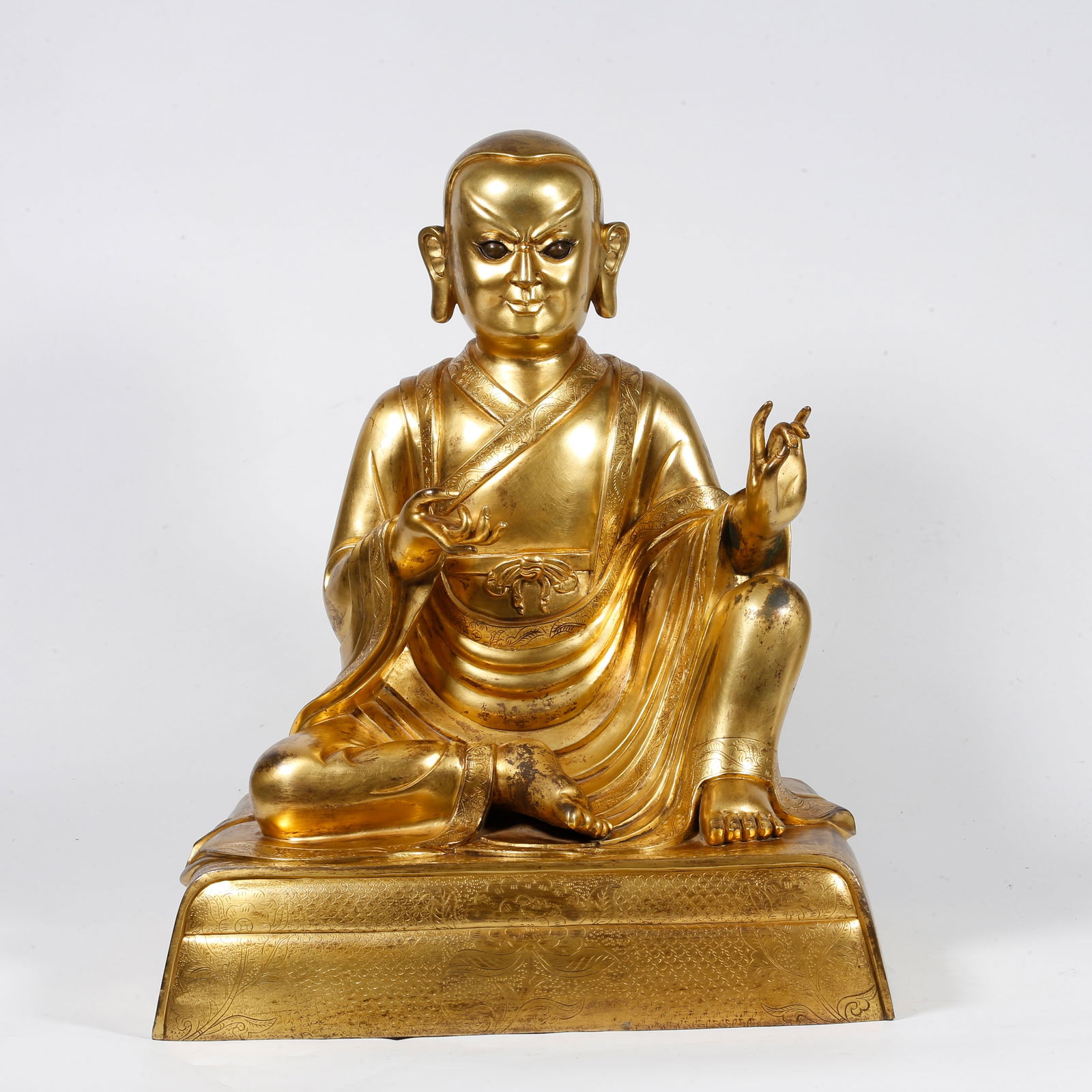A GILT-BRONZE ARHAT STATUE (1 of 9)