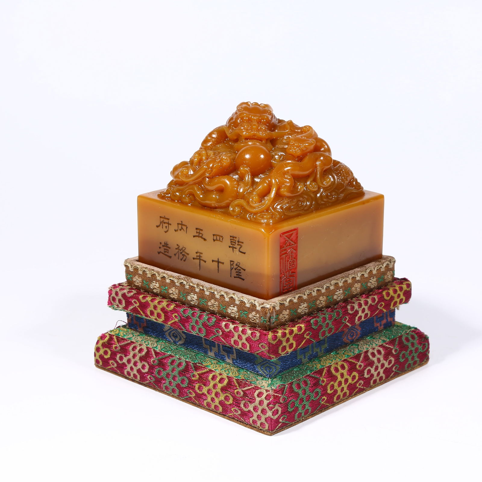 A SHOUSHAN TIANHUANG STONE SEAL WITH DRAGON KNOB: Shoushan Tianhuang stone seal with dragon knob