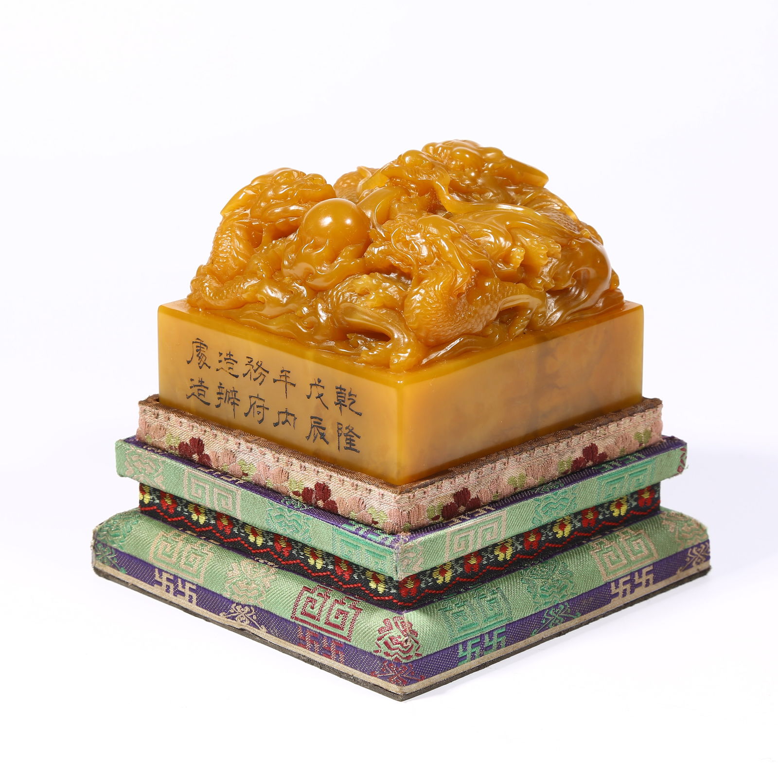 A SHOUSHAN TIANHUANG STONE SEAL WITH DRAGON KNOB: Shoushan Tianhuang stone seal with dragon knob