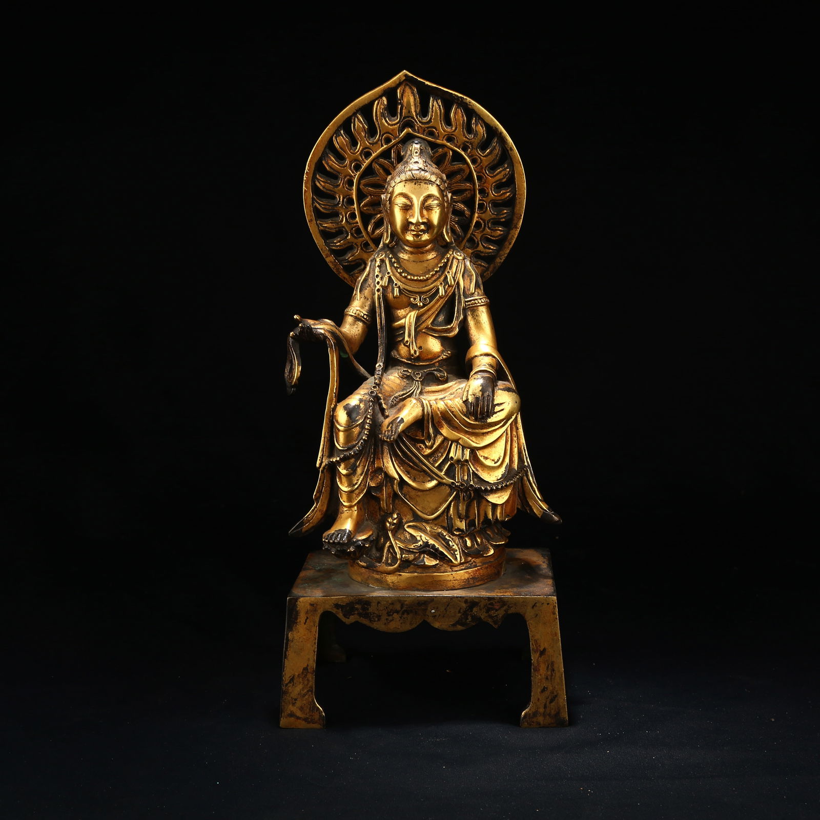 A GILT BRONZE FIGURE OF A BODHISATTVA (1 of 8)