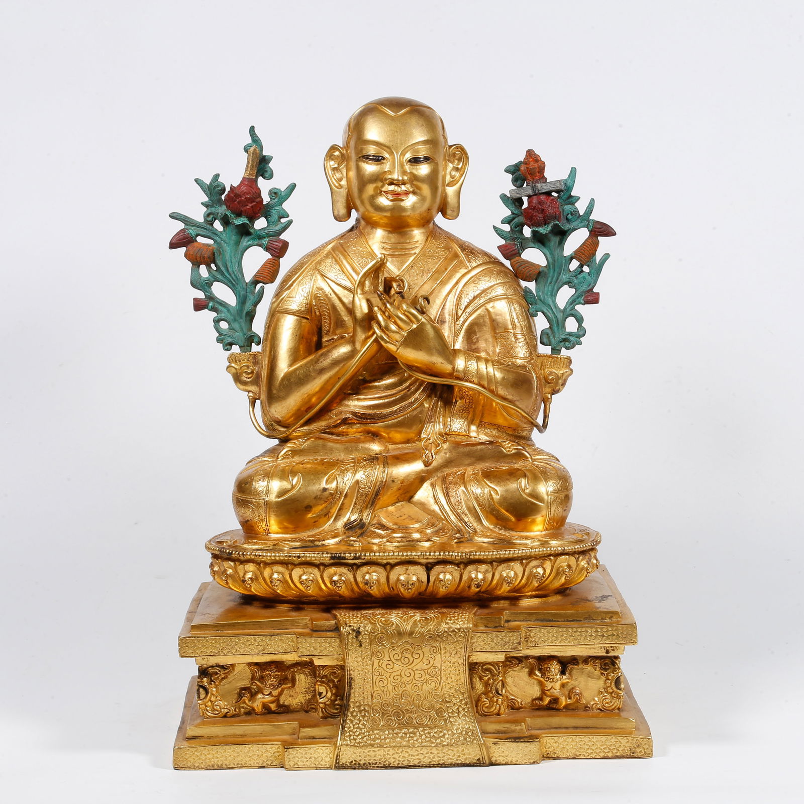 A GILT-BRONZE MASTER STATUE: Gilt-bronze master statue