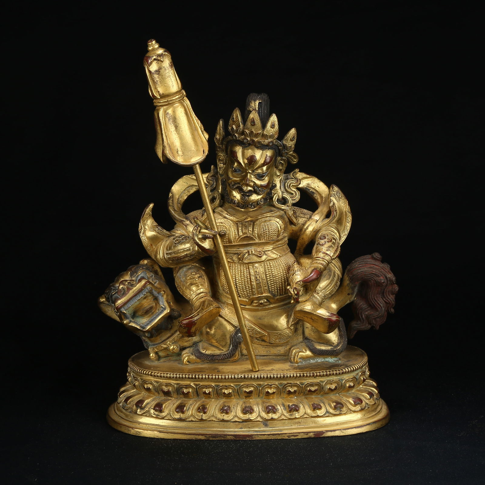 A GILT BRONZE FIGURE OF THE TREASURE KING (VAI?RAVA?A) (1 of 8)