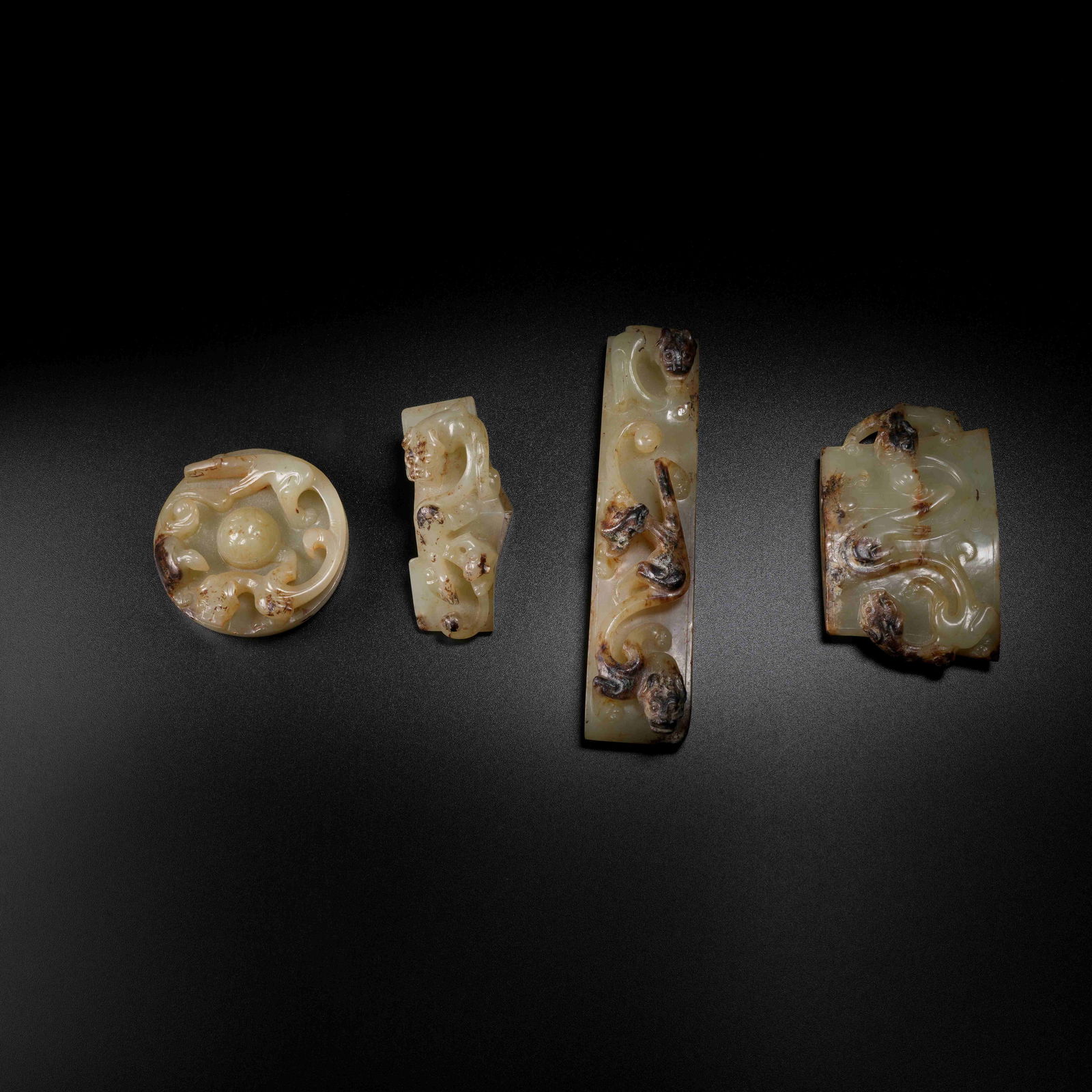 A ARCHAIC JADE CHILONG-PATTERN SWORD FITTINGS SET: Archaic Jade Chilong-Pattern Sword Fittings Set