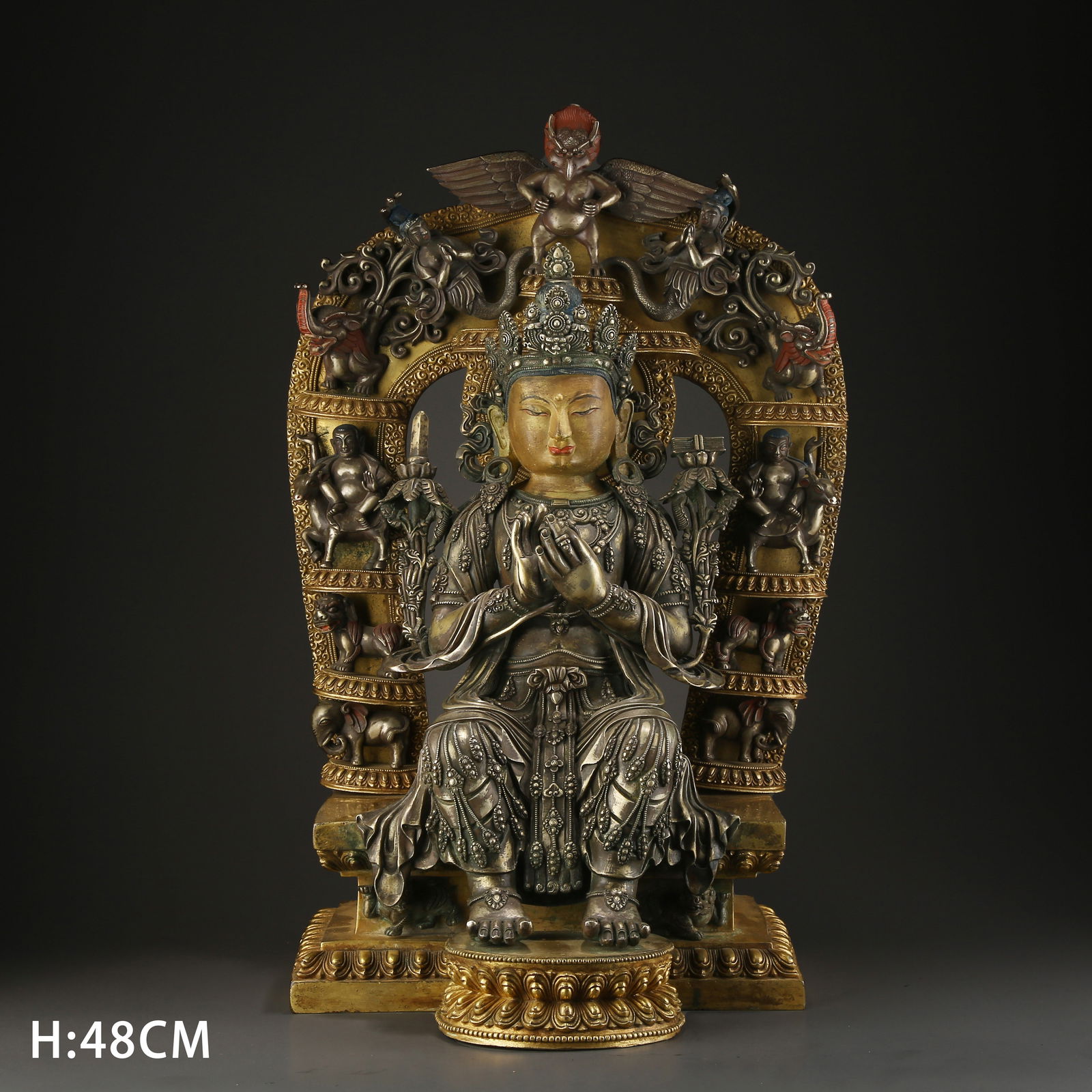 A TIBETAN SILVER SEATED STATUE OF MANJUSHRI: Tibetan silver seated statue of Manjushri